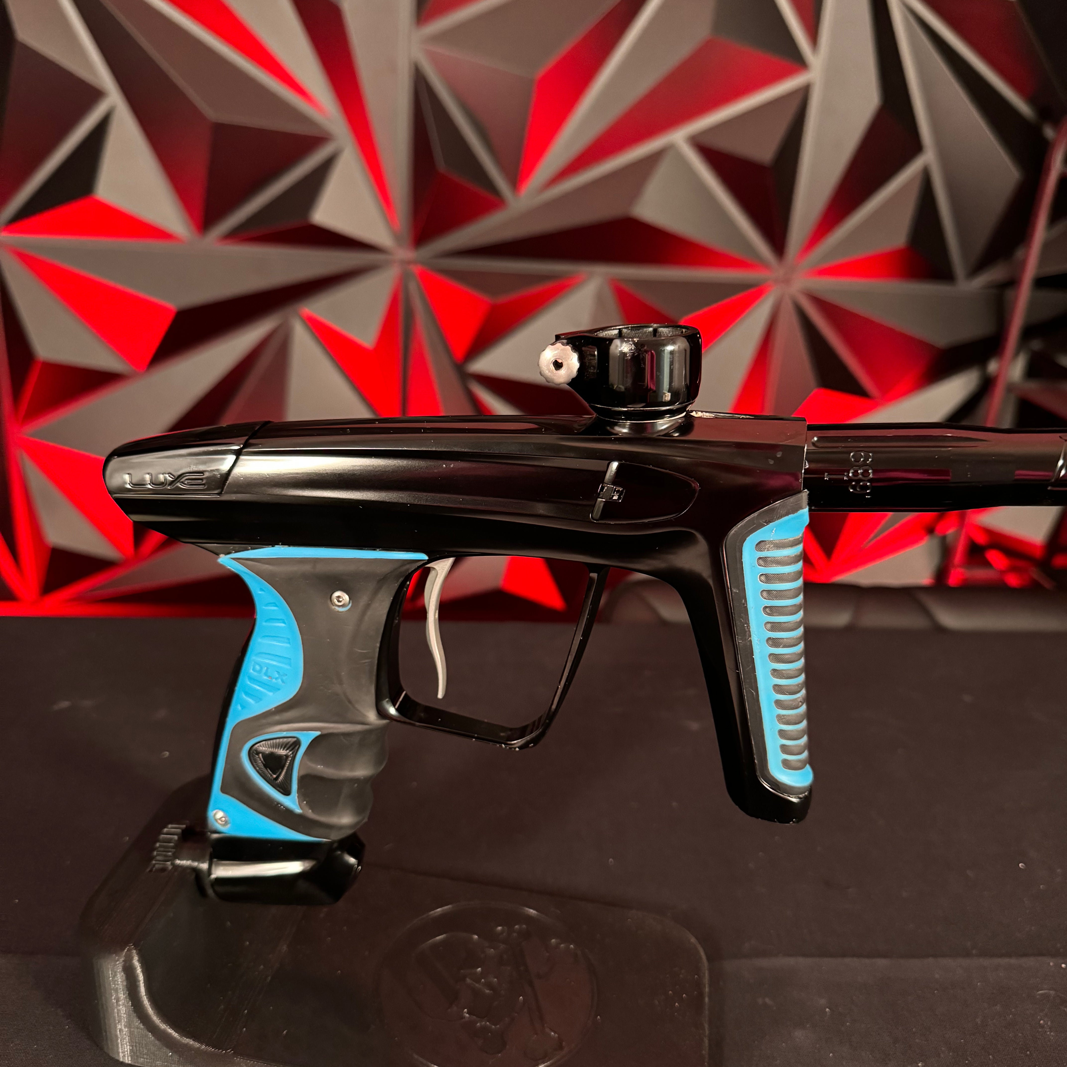 Used DLX Luxe X Paintball Gun - Black w/ Blue Grips