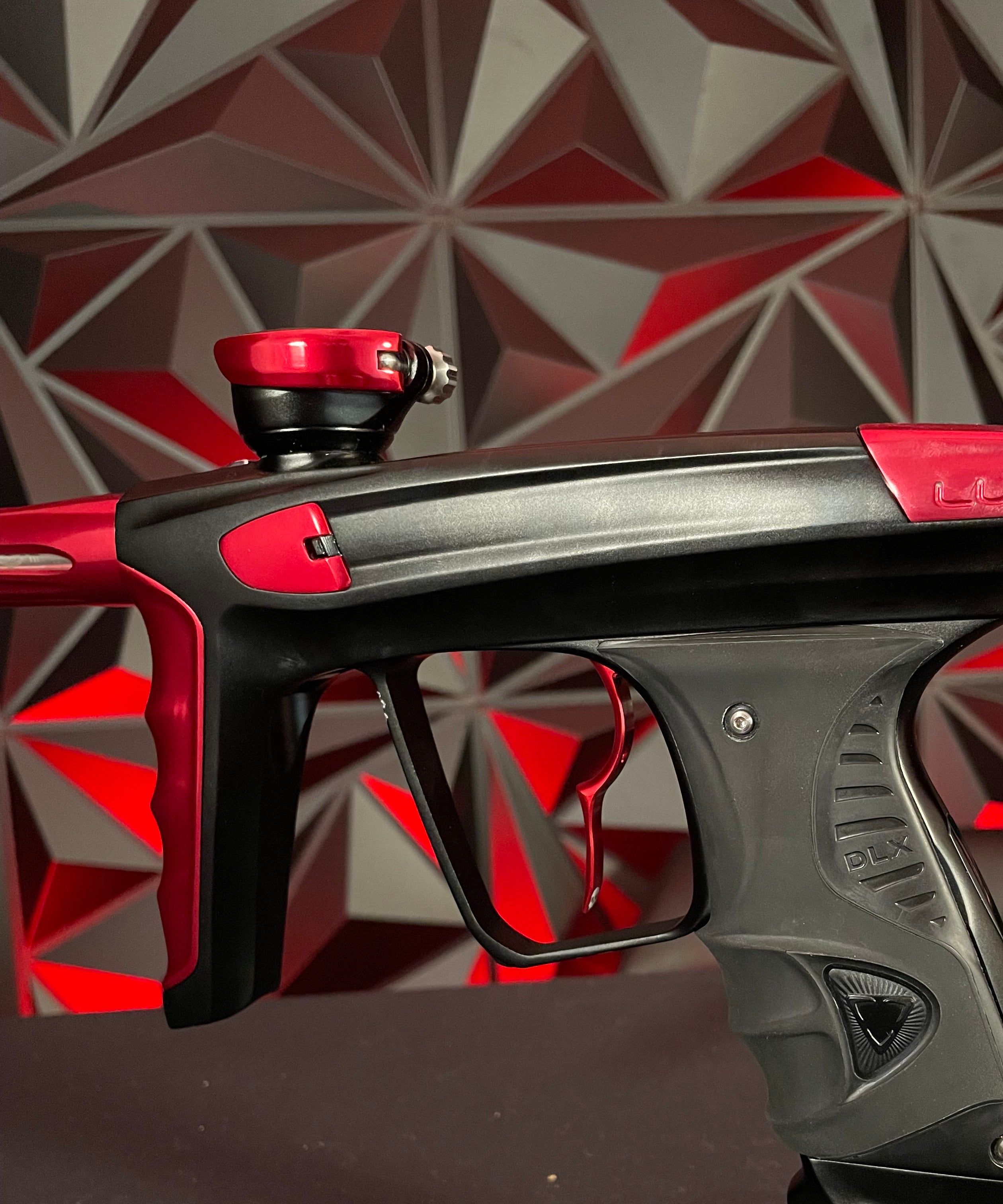 Used DLX Luxe X Paintball Gun - Dust Black / Gloss Red w/ Infamous Deuce Trigger