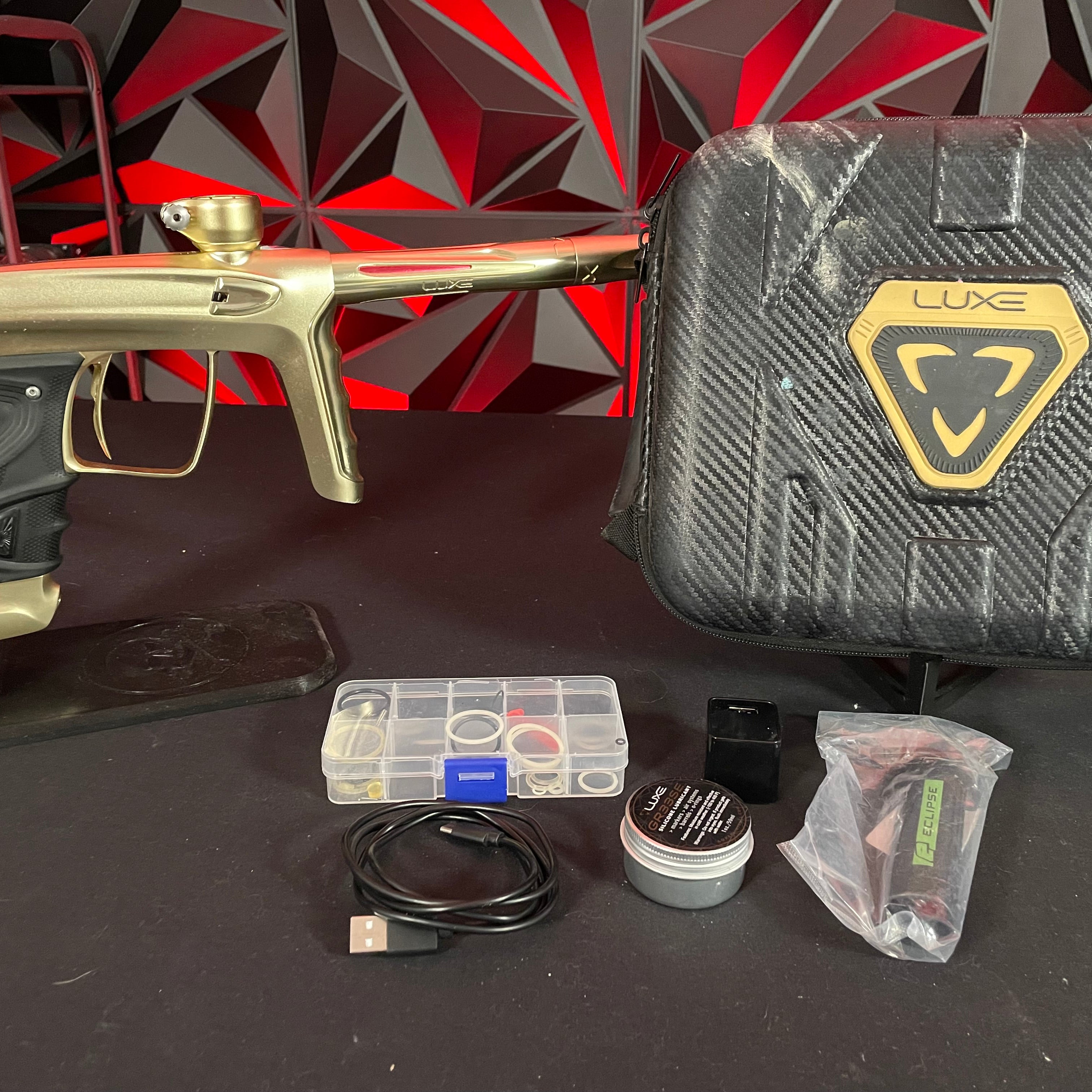 Used DLX TM40 Paintball Gun - Dust Gold/Polished Gold