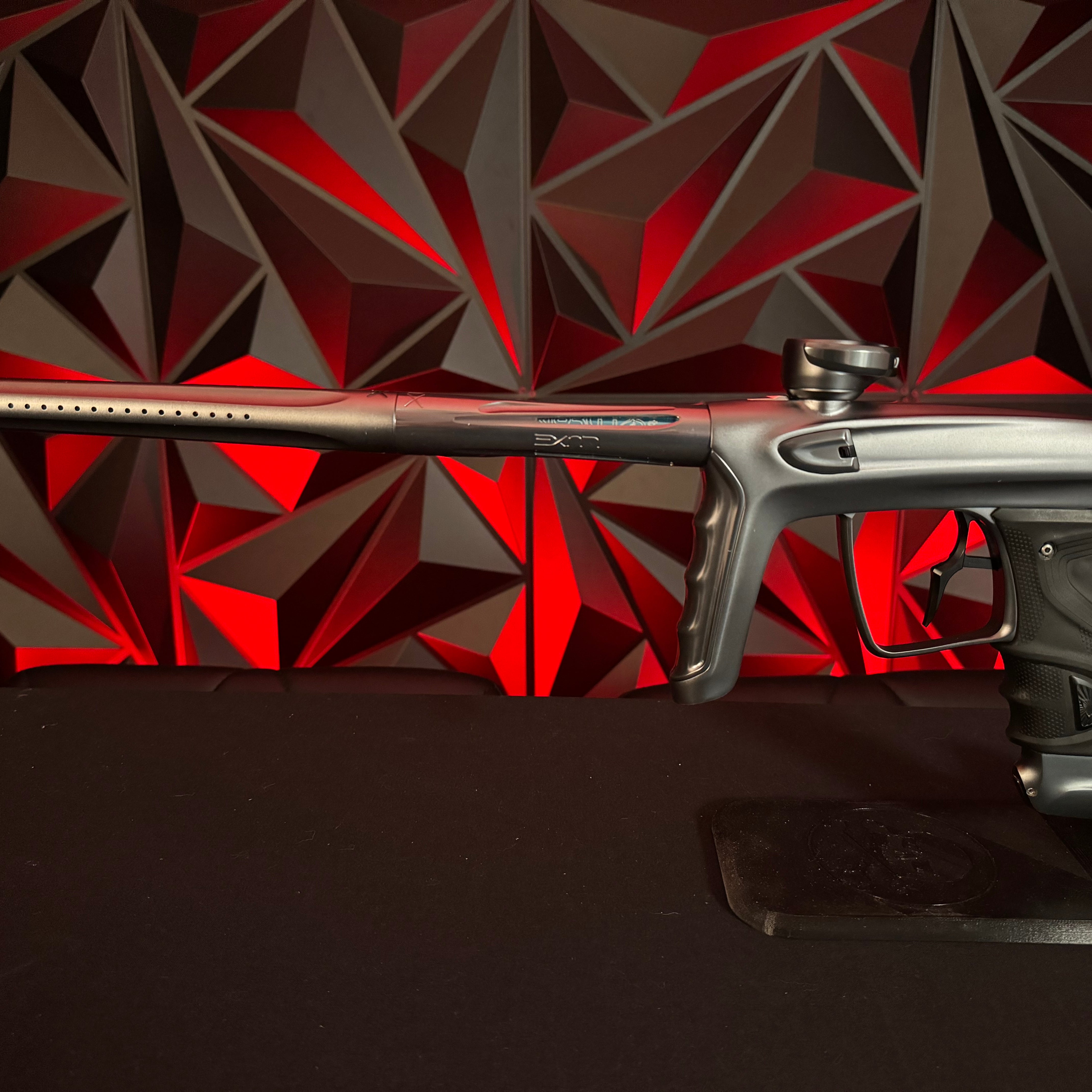 Used DLX TM40 Paintball Gun - Polished Pewter/Dust Pewter w/Infamous Deuce Trigger *Right side eye cover is Polished Black*