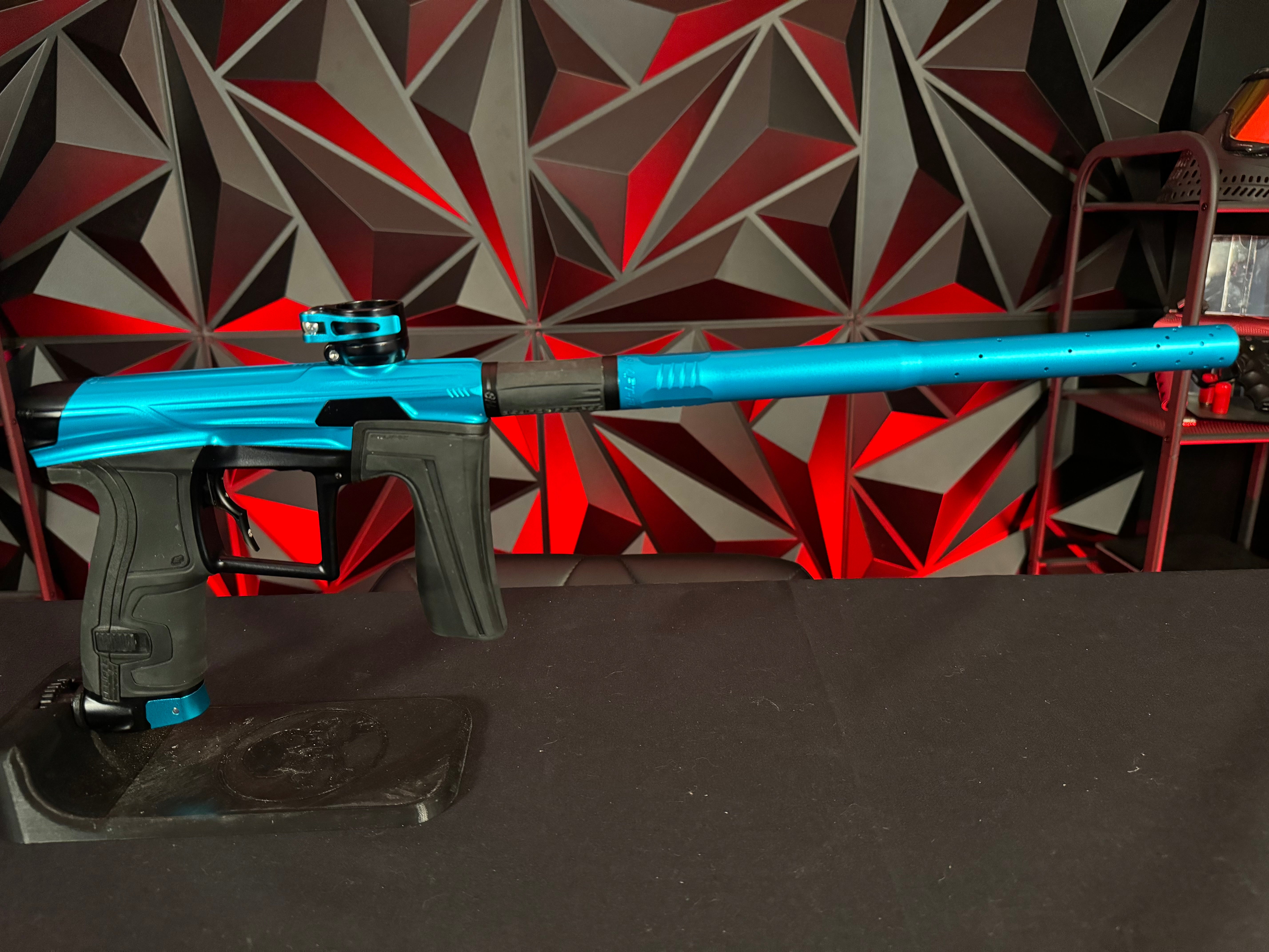 Used Planet Eclipse Geo 4 Paintball Gun - Teal/Black w/Infamous Deuce Trigger & 3 FL Backs
