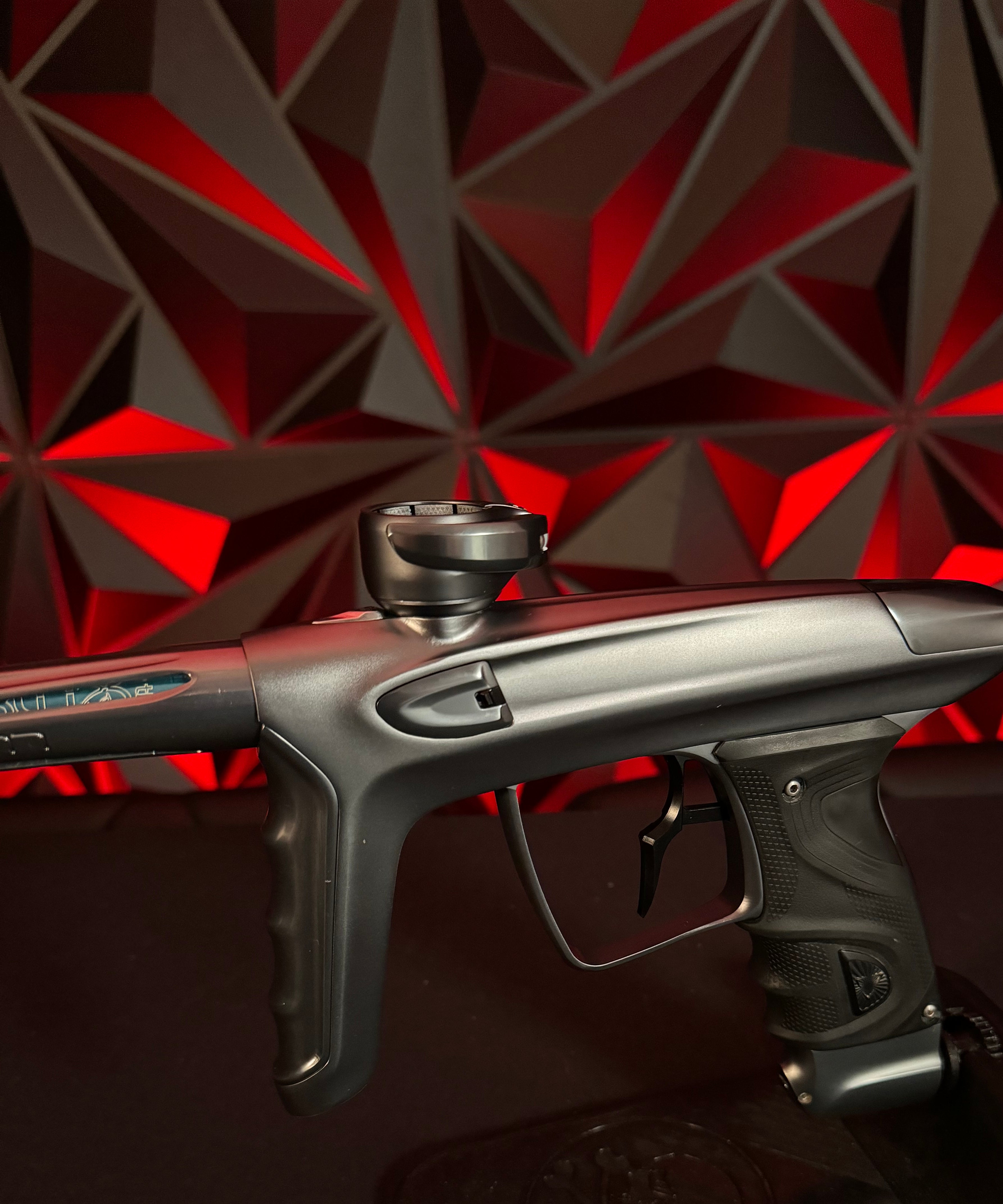 Used DLX TM40 Paintball Gun - Polished Pewter/Dust Pewter w/Infamous Deuce Trigger *Right side eye cover is Polished Black*