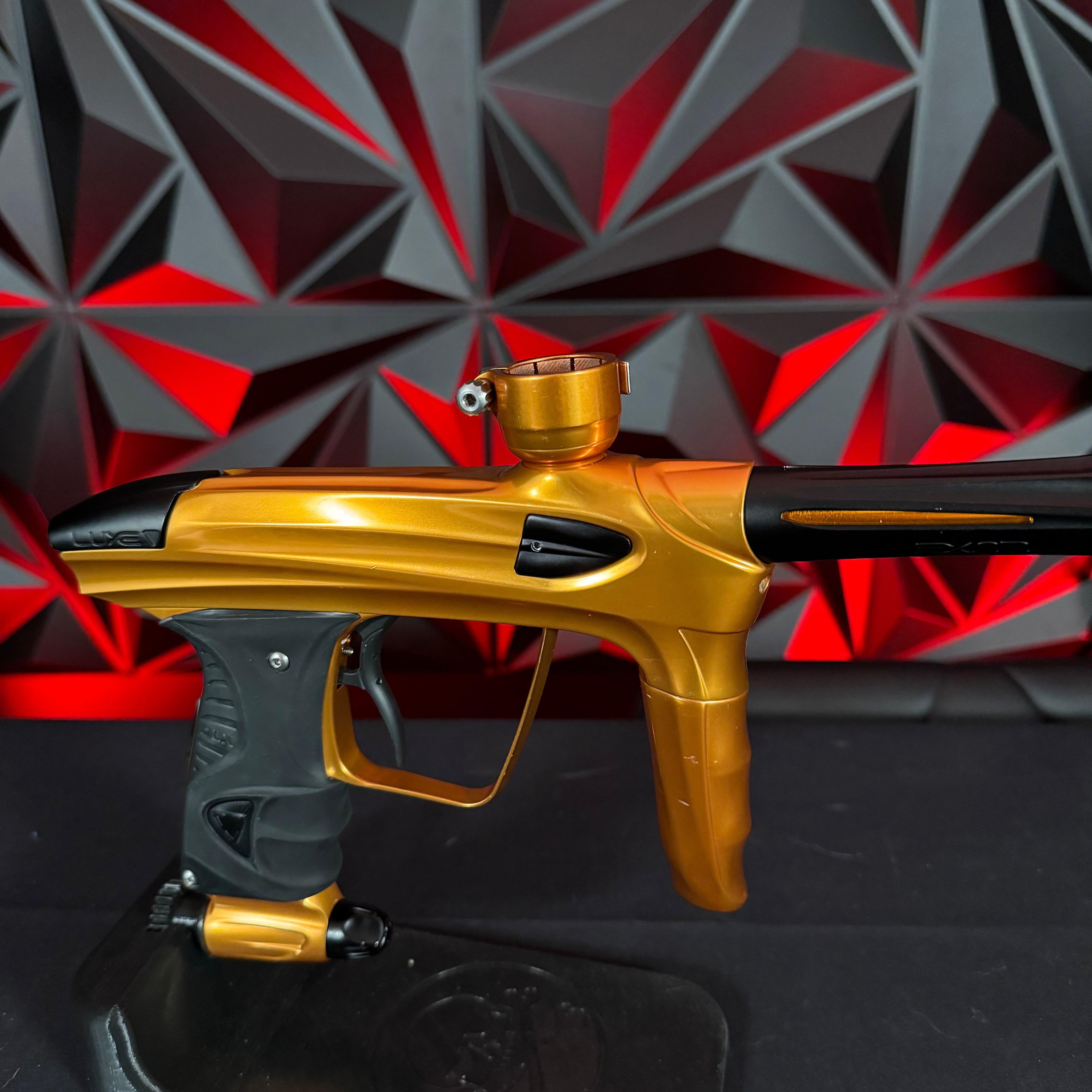 Used DLX Luxe 1.5 Paintball Gun - Polished Orange/Black w/2.0 Bolt