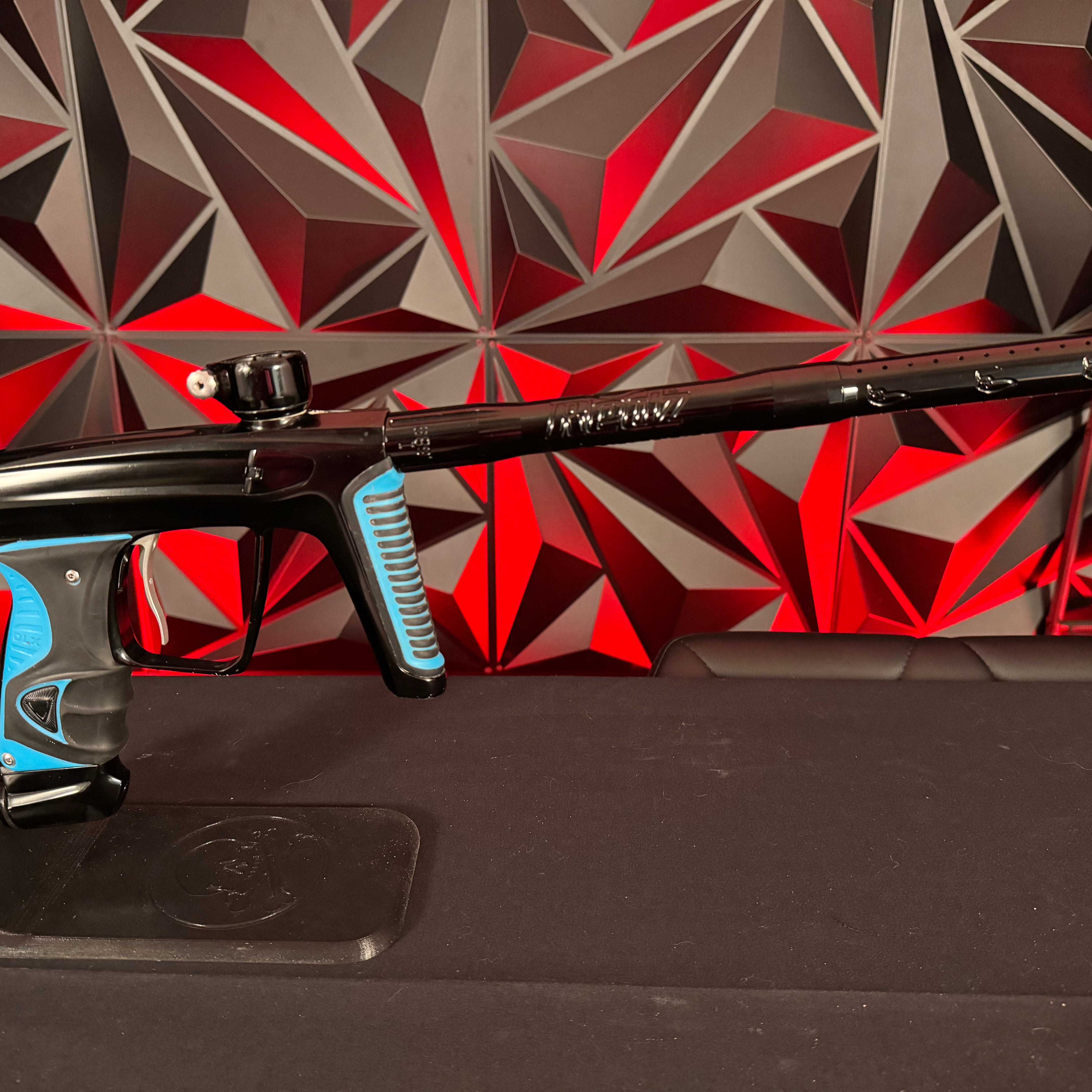 Used DLX Luxe X Paintball Gun - Black w/ Blue Grips