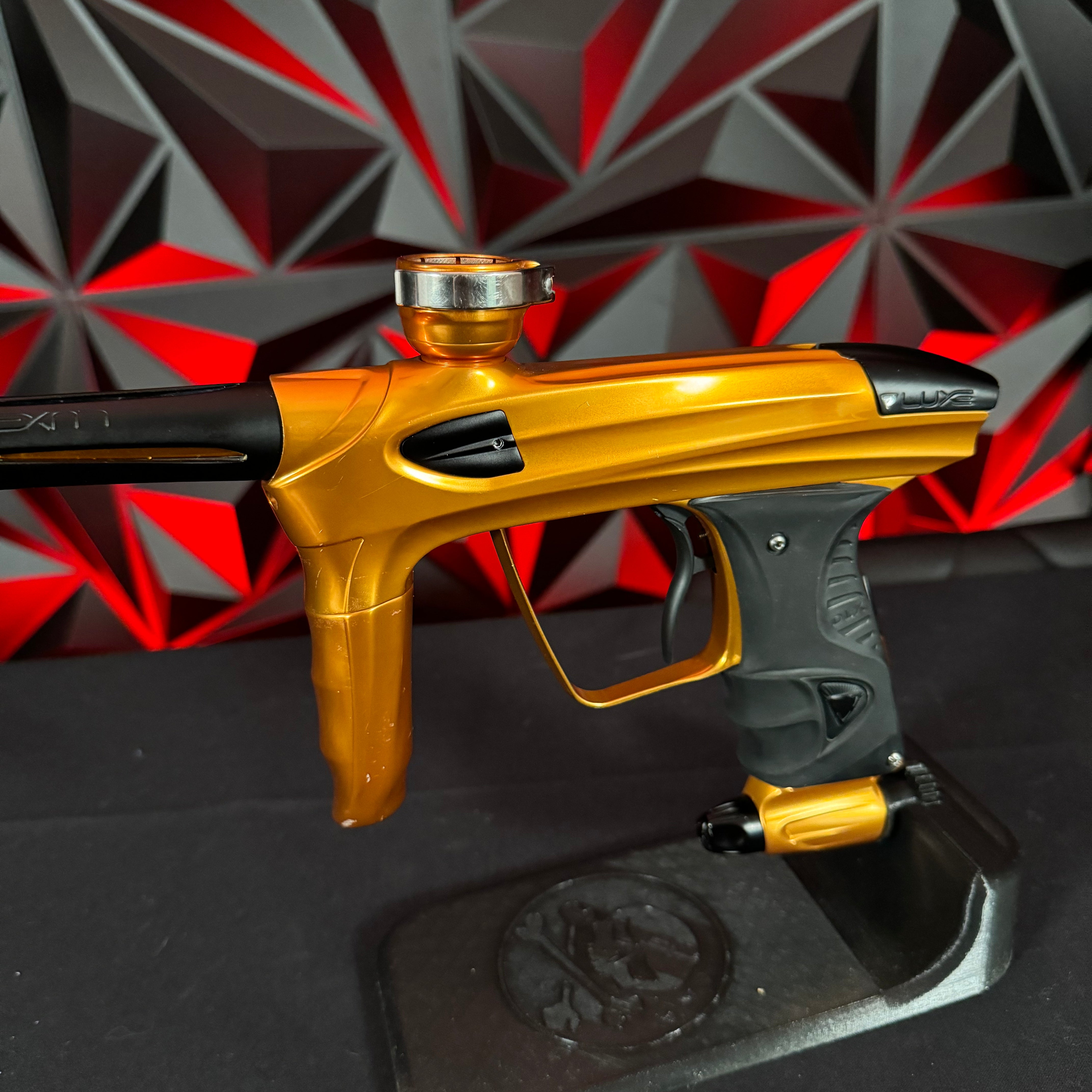 Used DLX Luxe 1.5 Paintball Gun - Polished Orange/Black w/2.0 Bolt