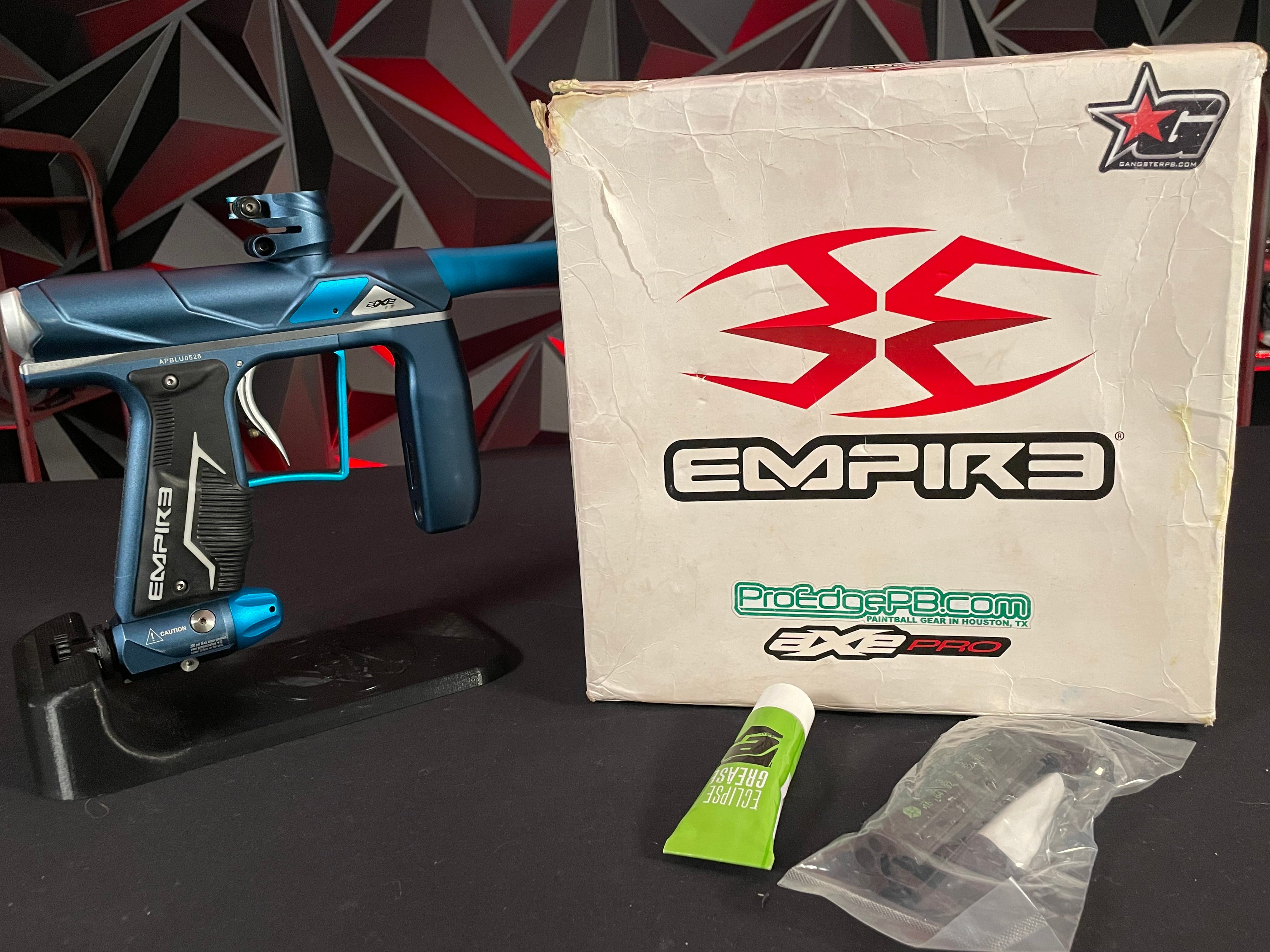 Used Empire Axe Pro Paintball Gun - Blue/Silver w/ Redline Board