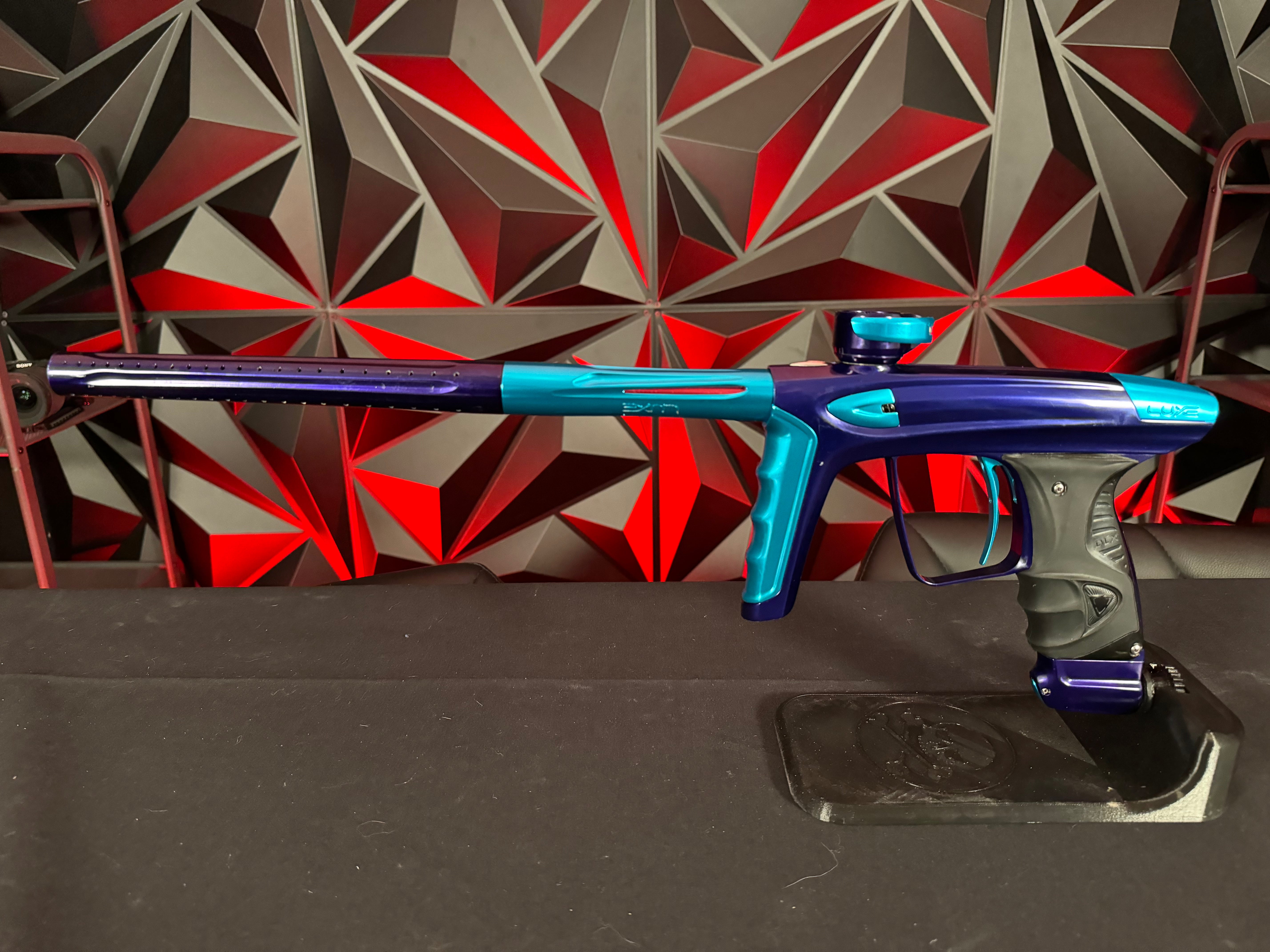 Used DLX Luxe Ice Paintball Gun - Polished Purple / Polished Teal w/ 5 Freak Inserts