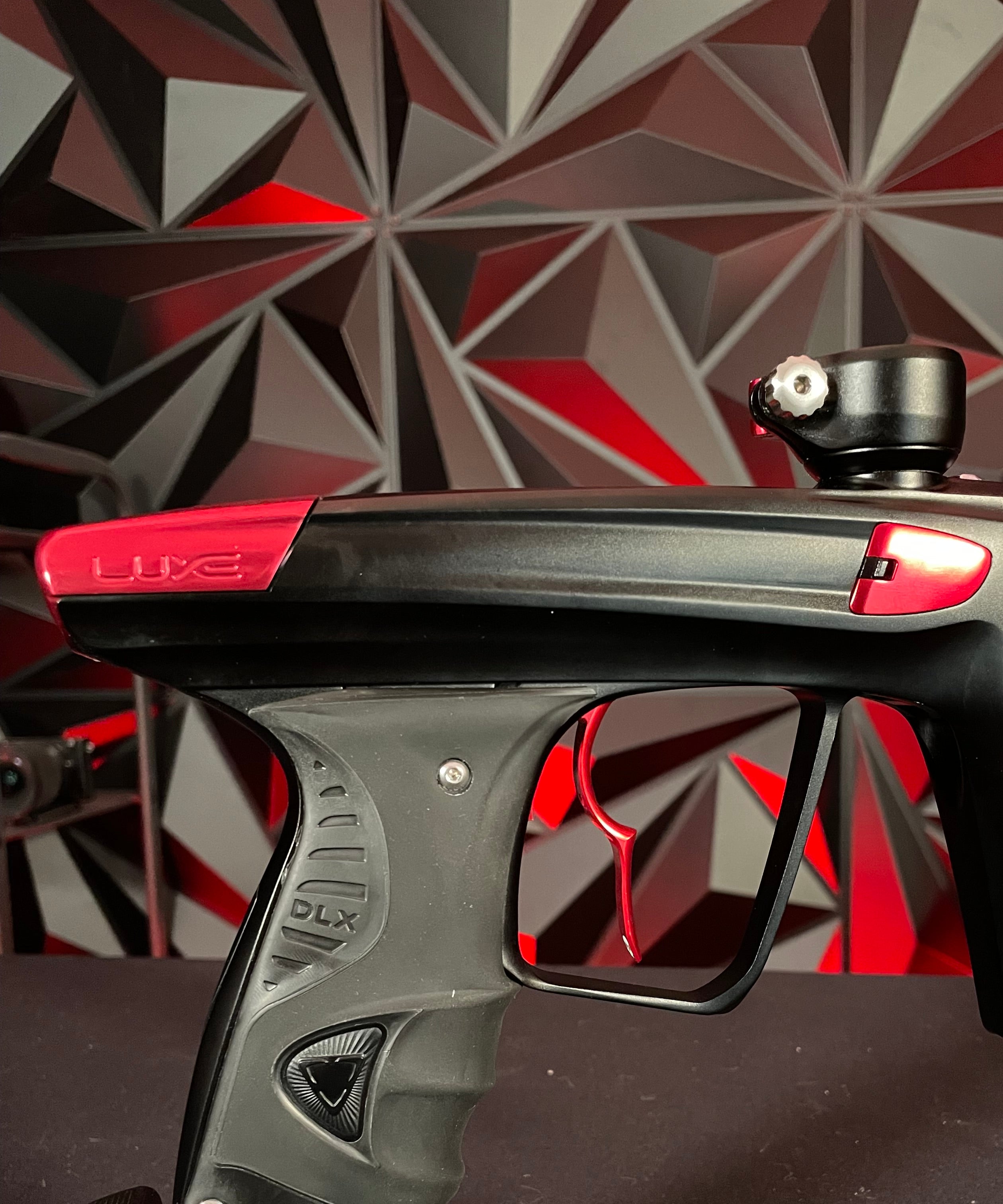 Used DLX Luxe X Paintball Gun - Dust Black / Gloss Red w/ Infamous Deuce Trigger