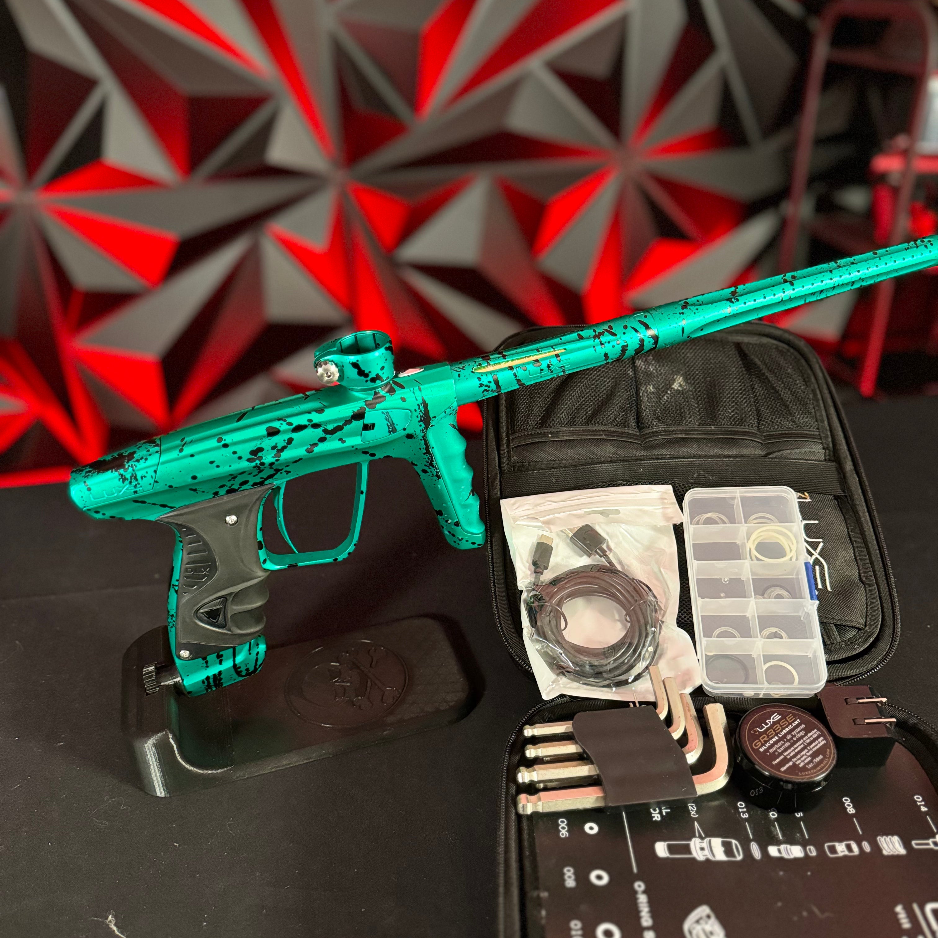 Used DLX Luxe X Paintball Gun - Green Splash