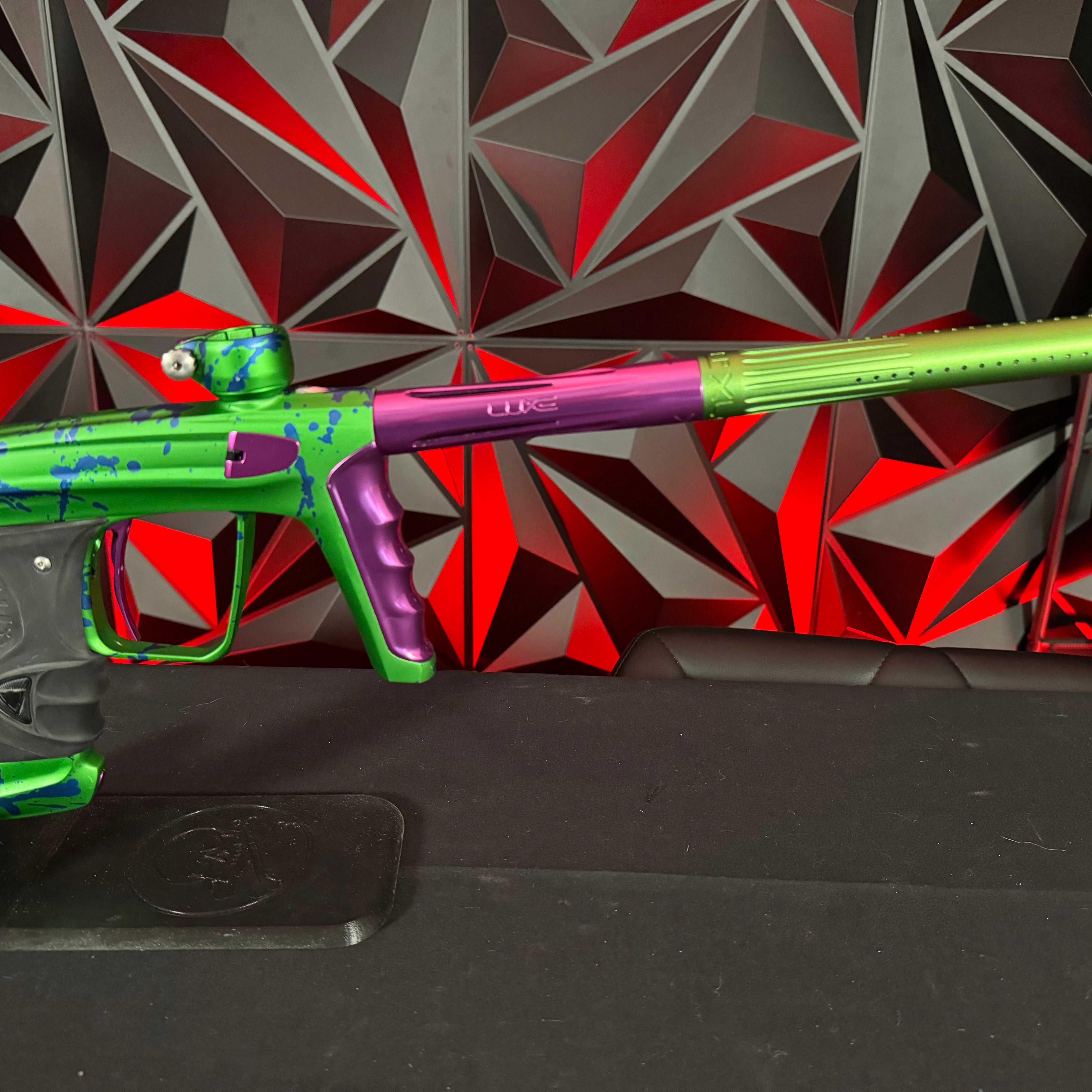 Used DLX Luxe X Paintball Marker - LE Green/Purple Splash w/Green ACP Tip
