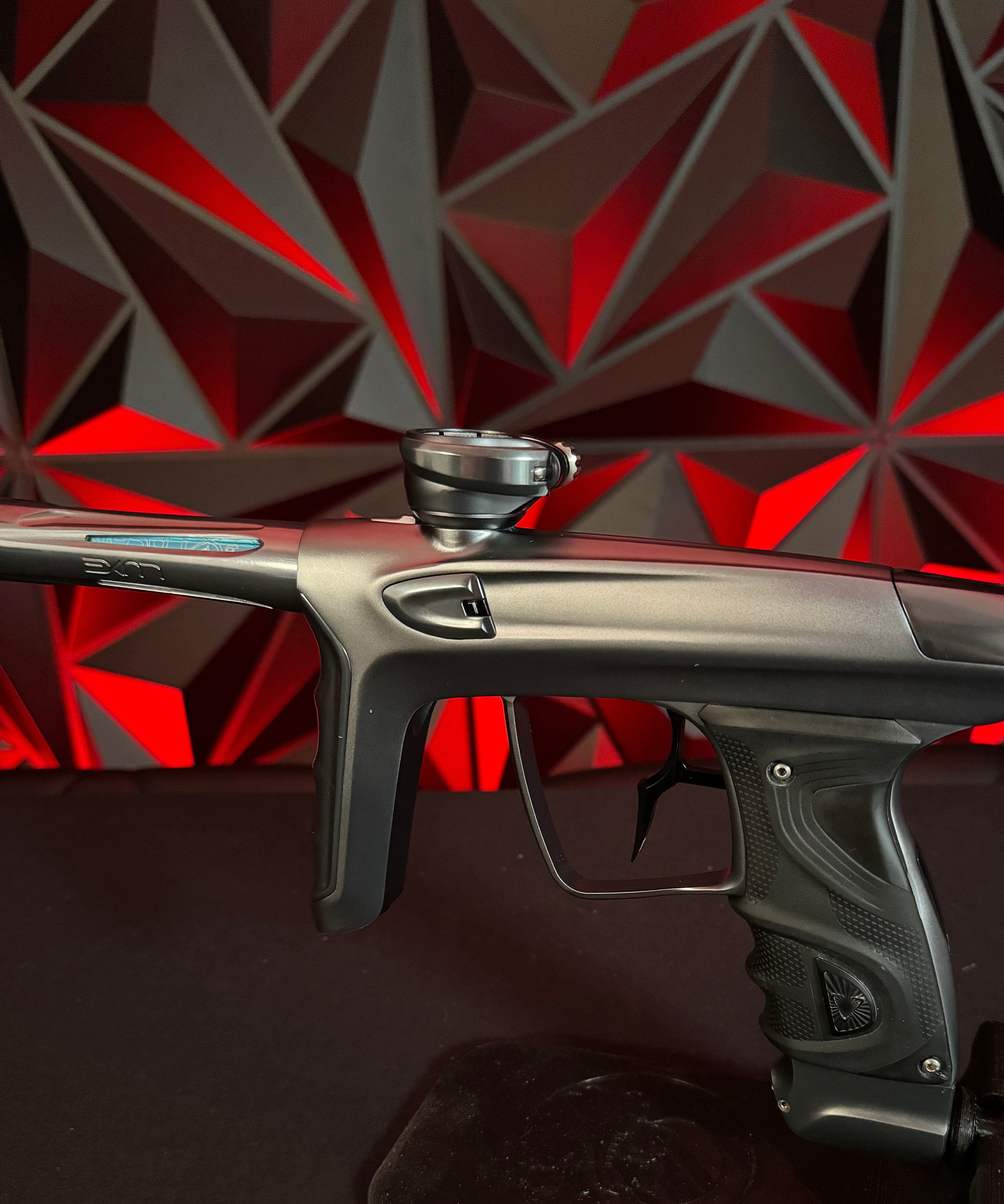 Used DLX TM40 Paintball Gun - Polished Pewter/Dust Pewter w/Infamous Deuce Trigger *Right side eye cover is Polished Black*