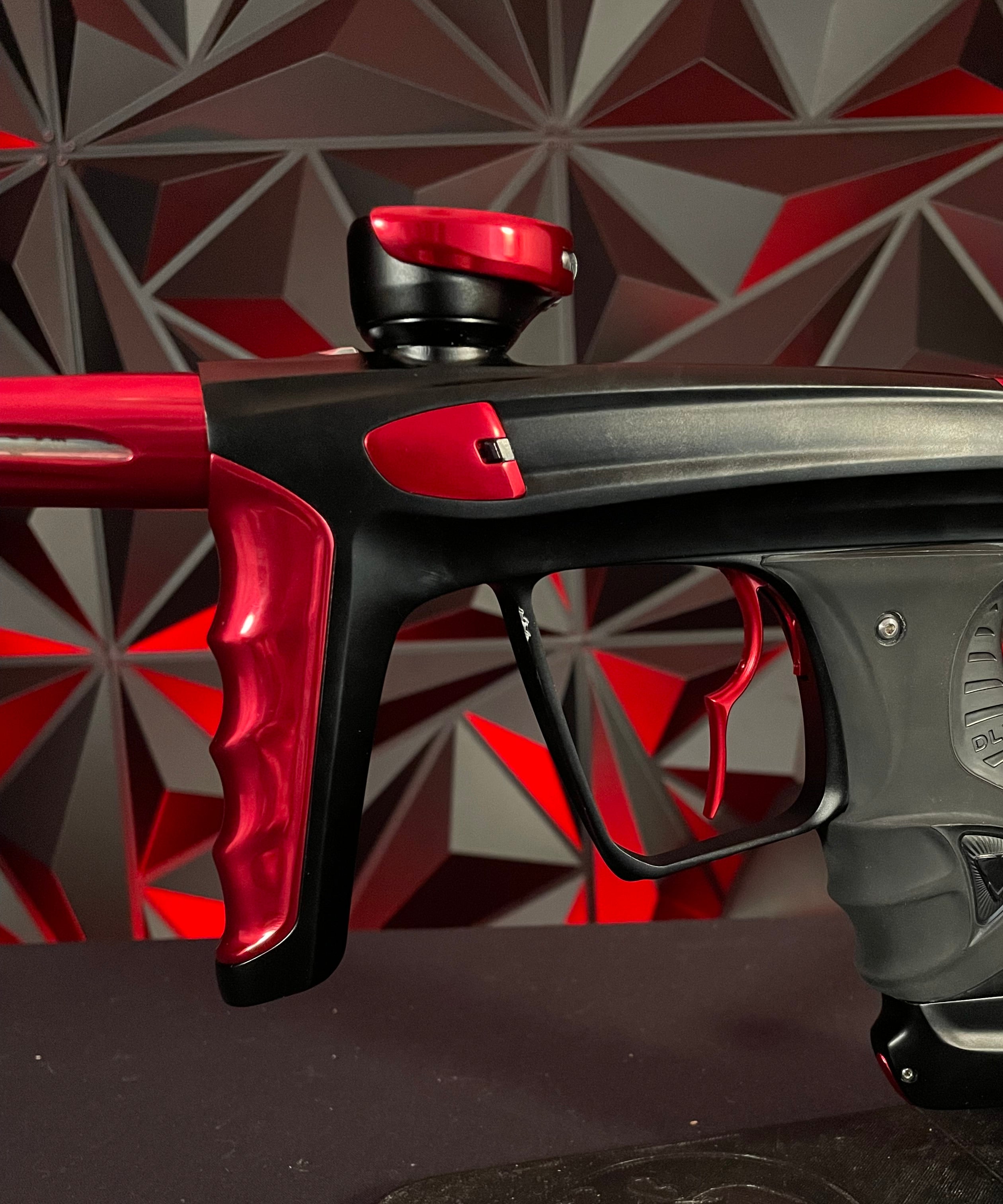 Used DLX Luxe X Paintball Gun - Dust Black / Gloss Red w/ Infamous Deuce Trigger