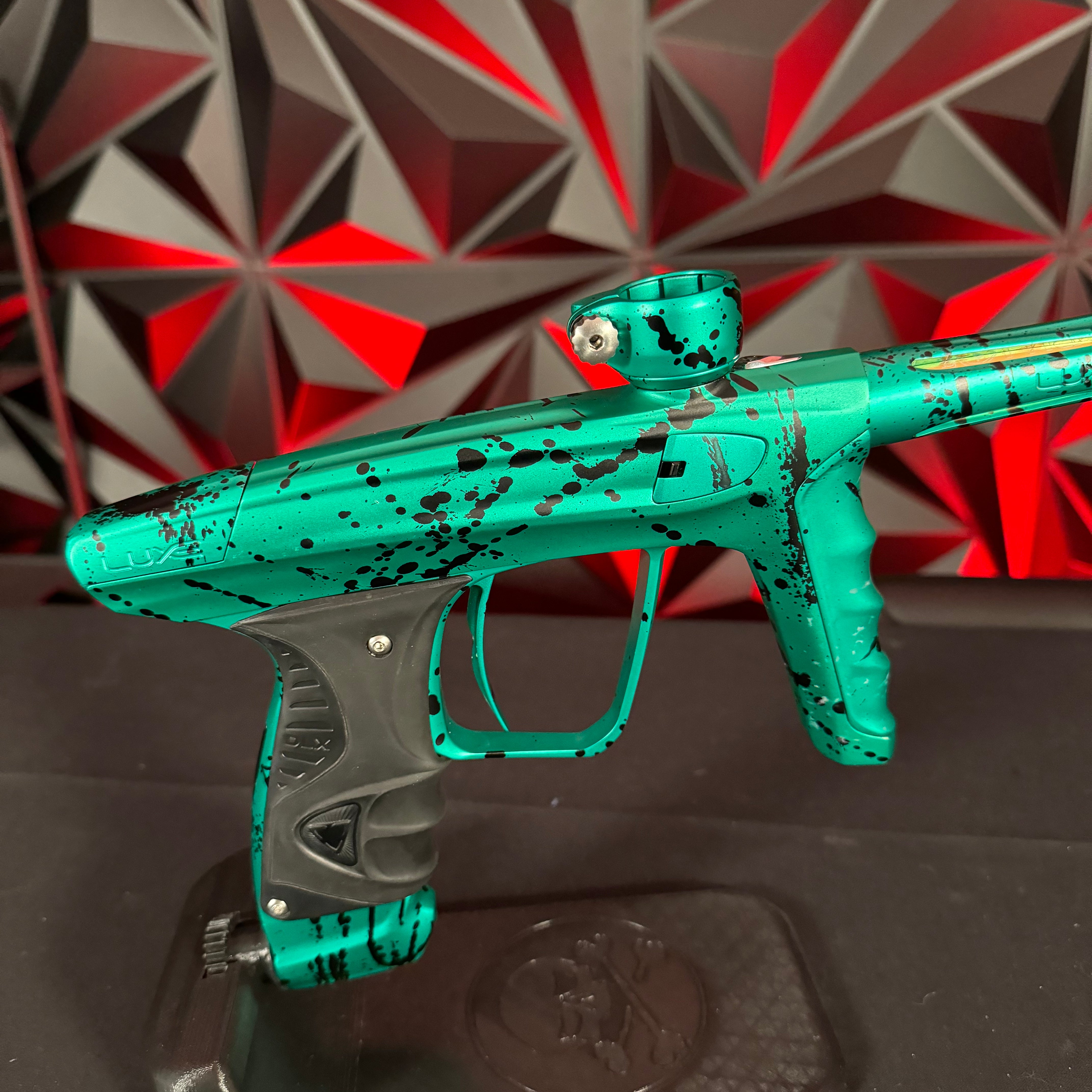 Used DLX Luxe X Paintball Gun - Green Splash