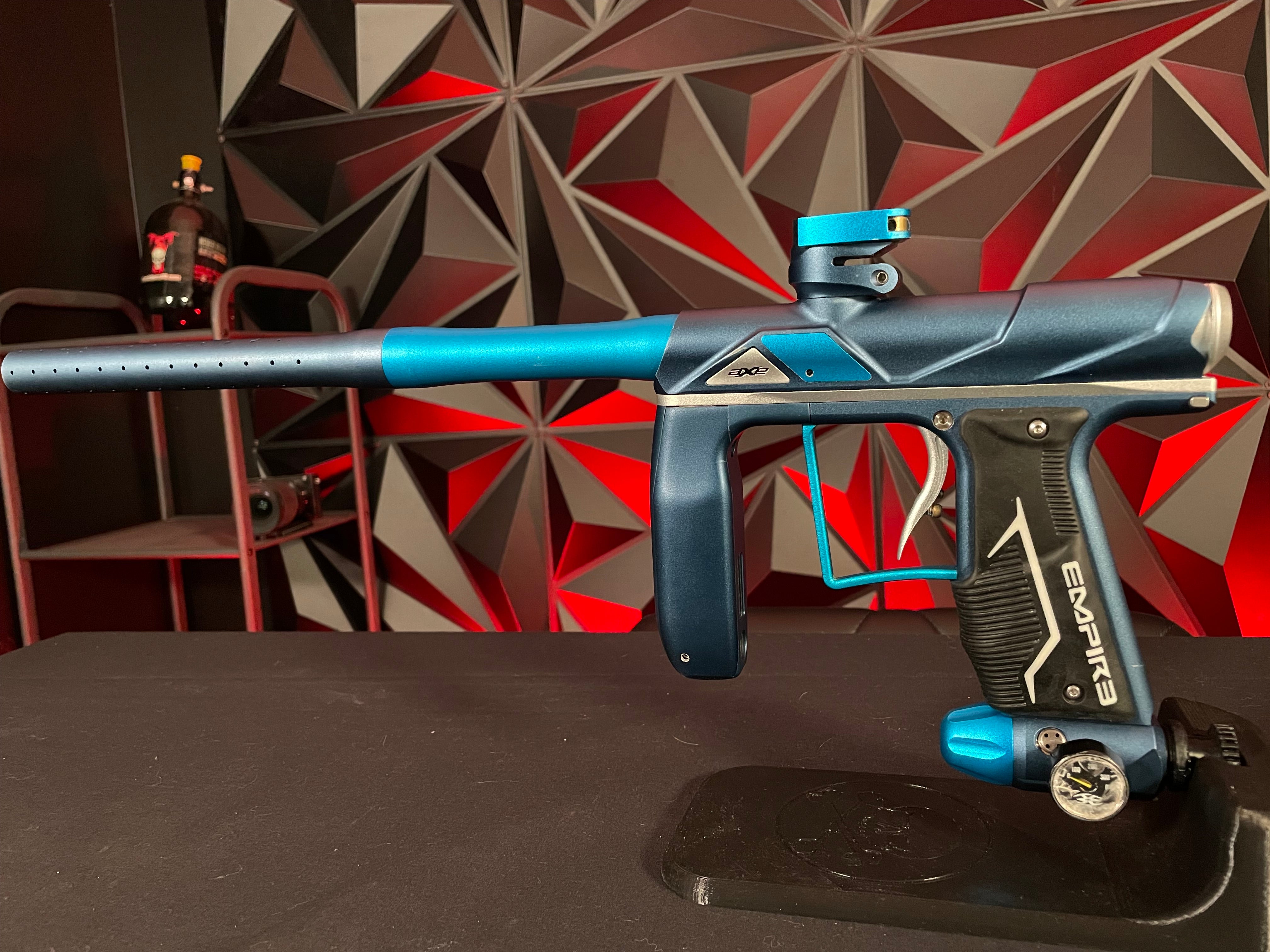Used Empire Axe Pro Paintball Gun - Blue/Silver w/ Redline Board