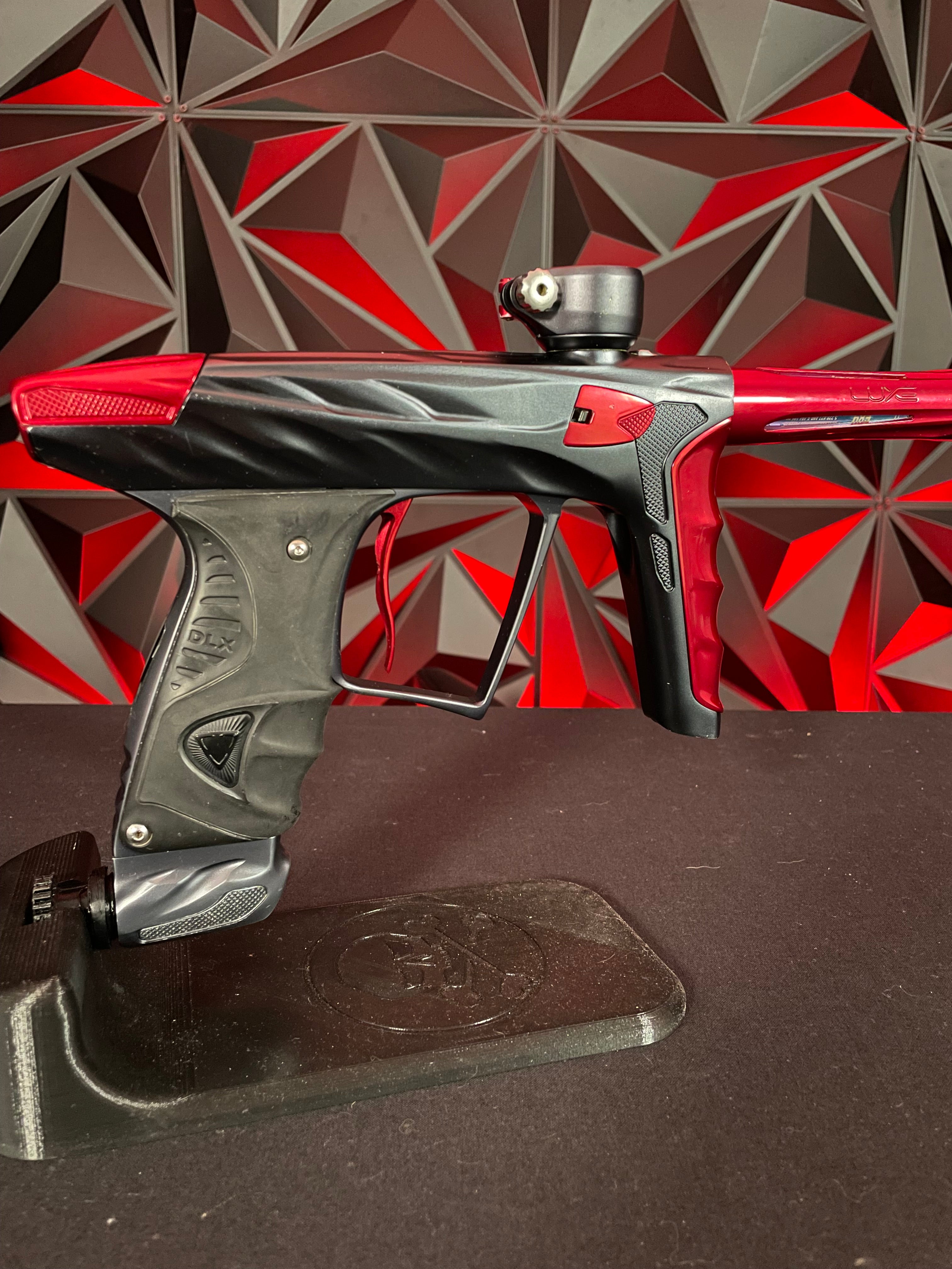 Used DLX Luxe X A51 Paintball Gun - Pewter/ Red