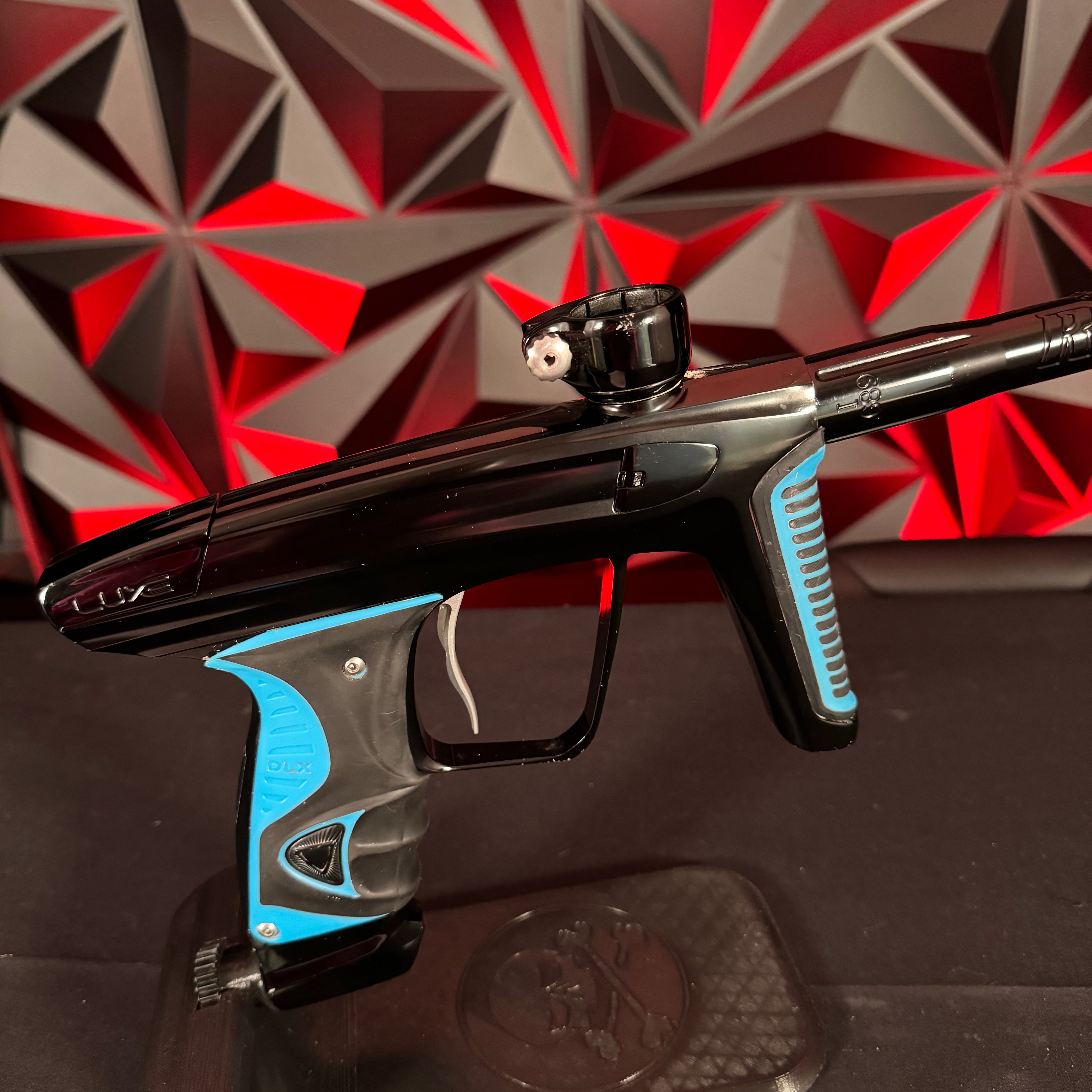 Used DLX Luxe X Paintball Gun - Black w/ Blue Grips