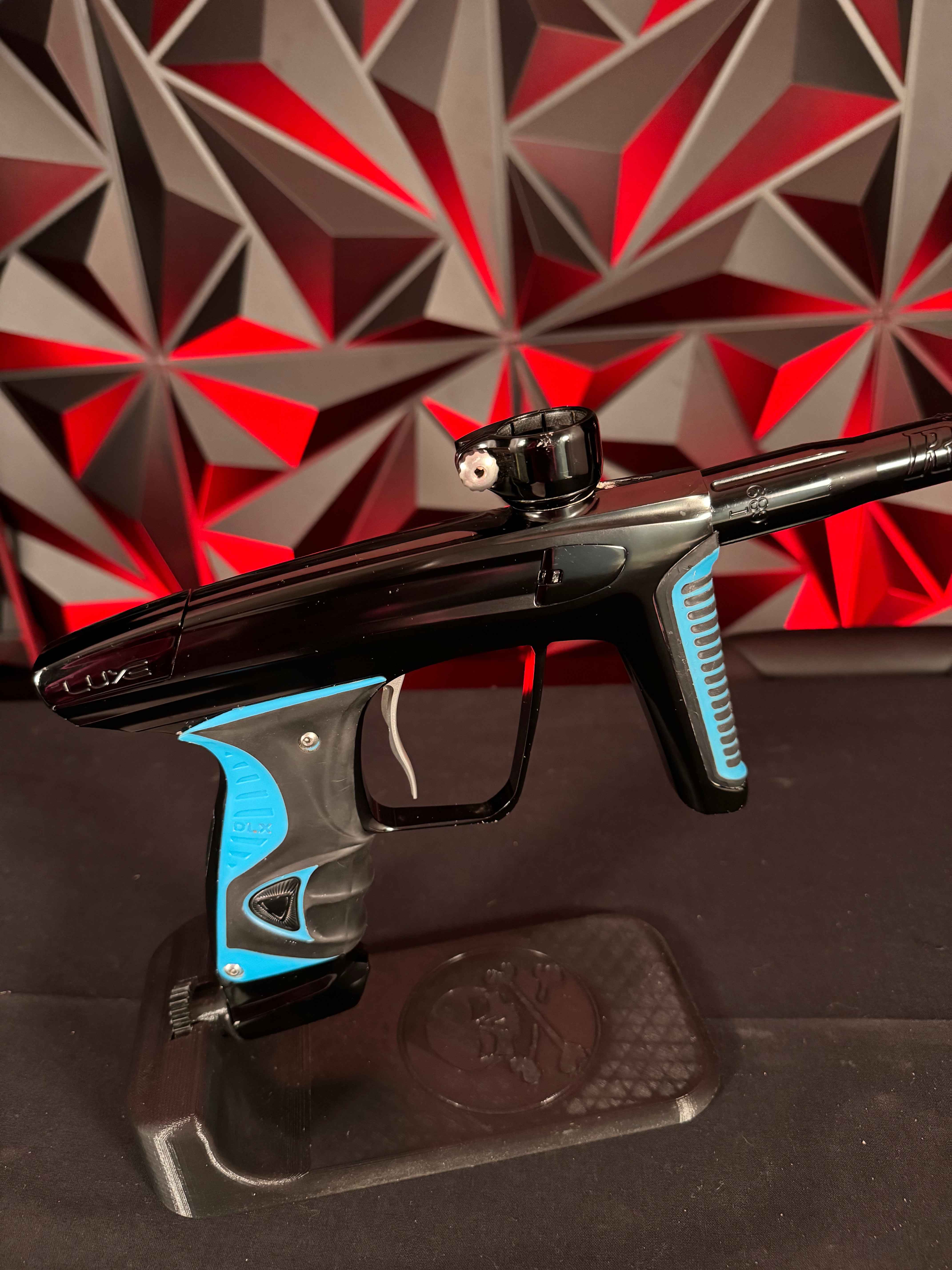 Used DLX Luxe X Paintball Gun - Black w/ Blue Grips