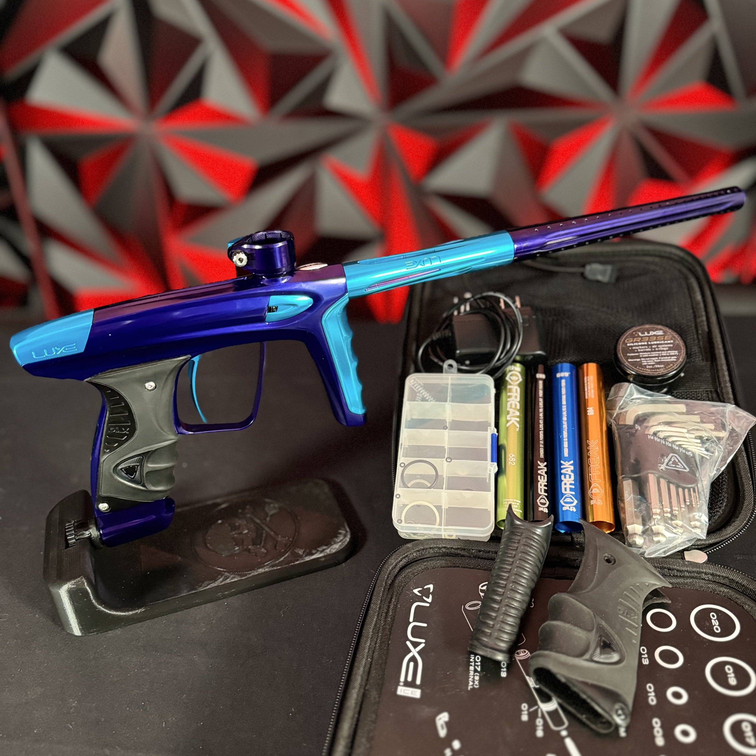 Used DLX Luxe Ice Paintball Gun - Polished Purple / Polished Teal w/ 5 Freak Inserts