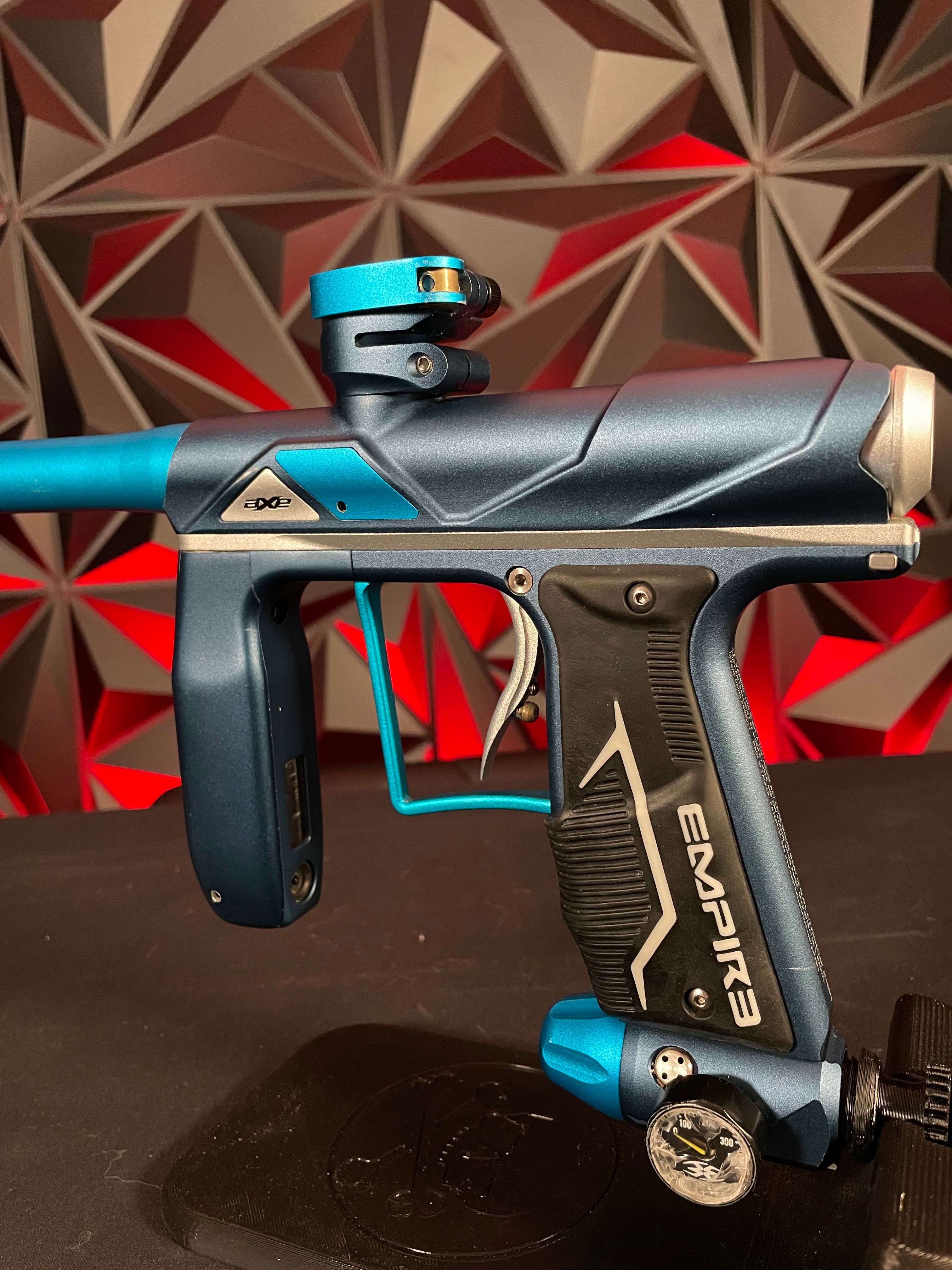 Used Empire Axe Pro Paintball Gun - Blue/Silver w/ Redline Board