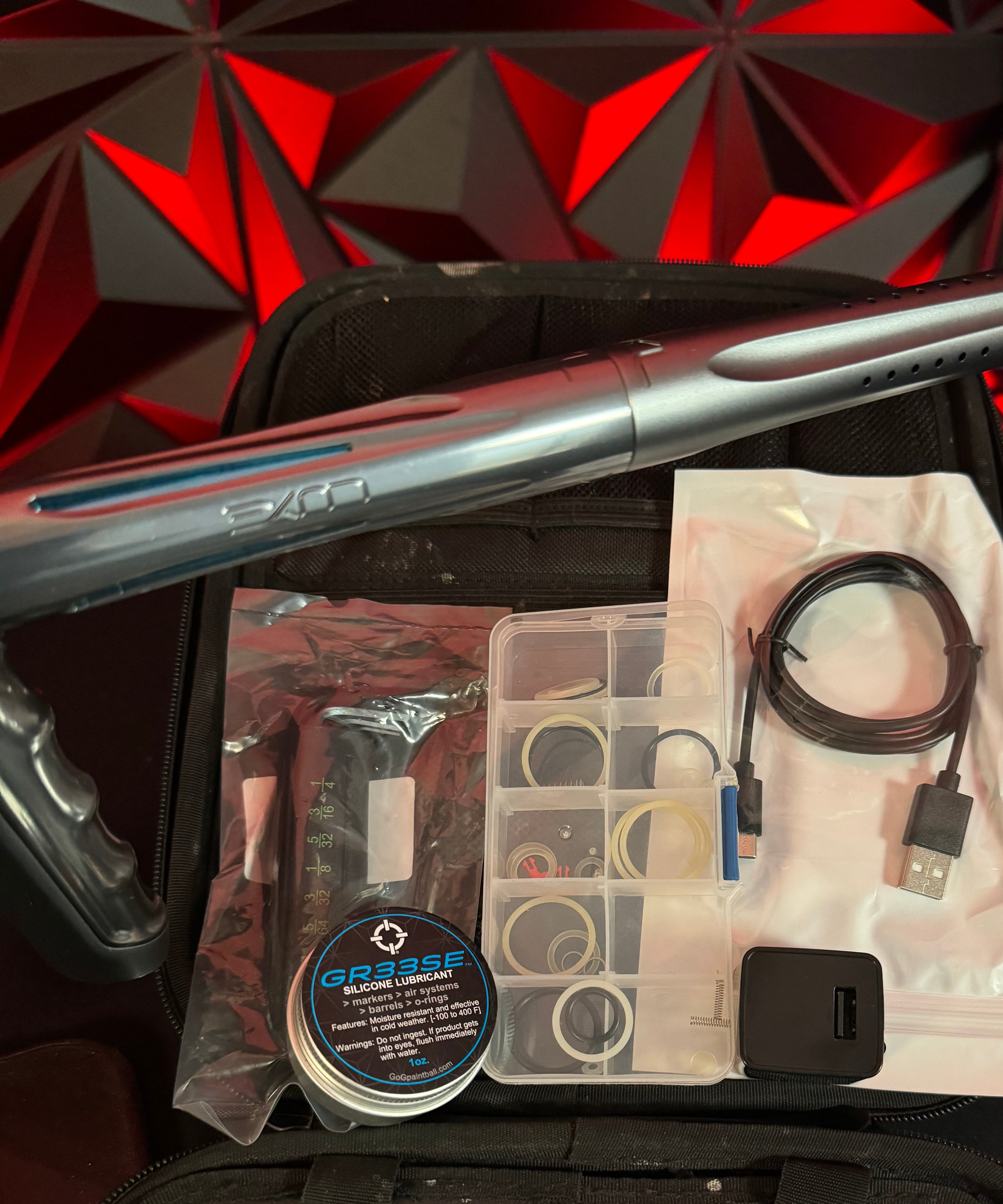 Used DLX TM40 Paintball Gun - Polished Pewter/Dust Pewter w/Infamous Deuce Trigger *Right side eye cover is Polished Black*
