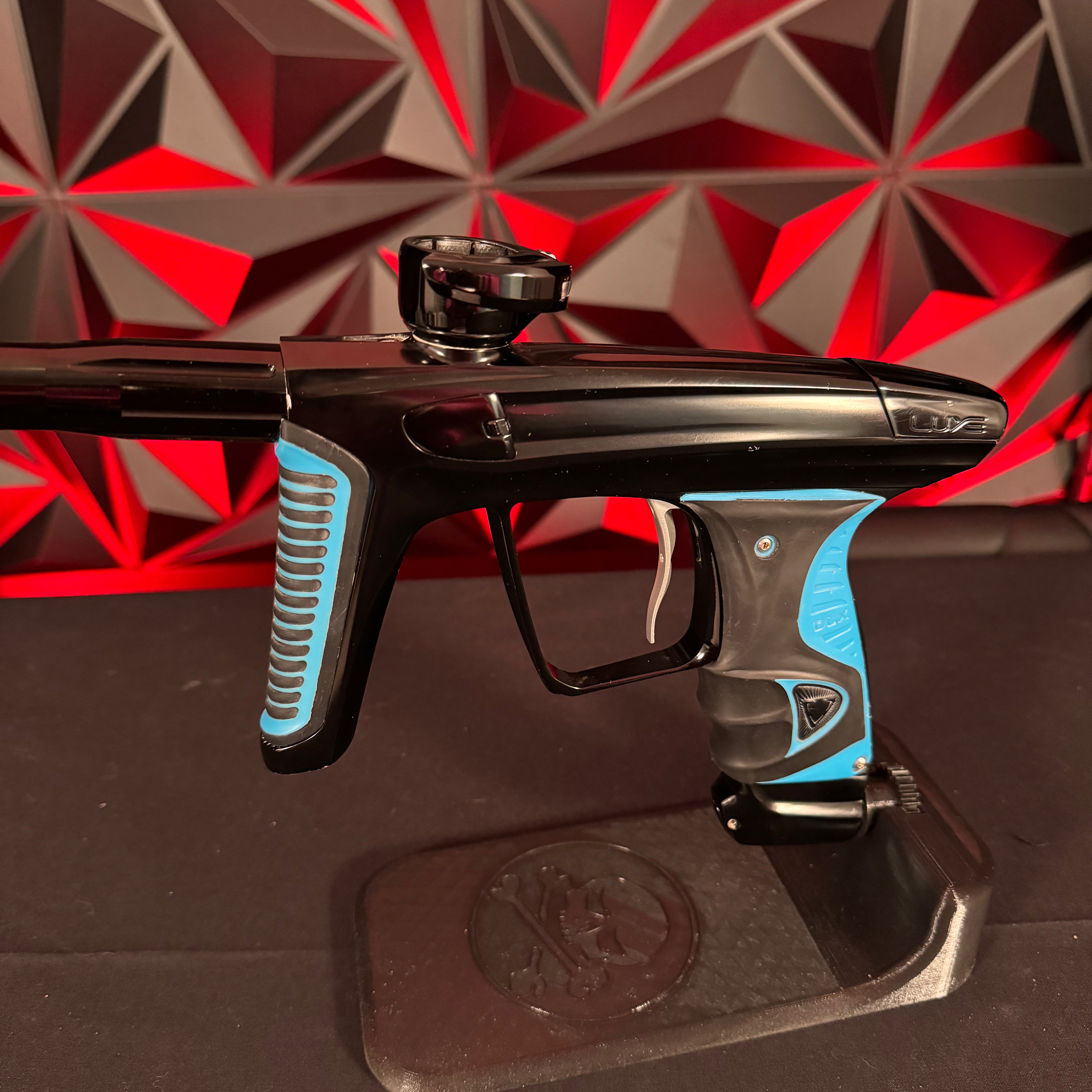 Used DLX Luxe X Paintball Gun - Black w/ Blue Grips