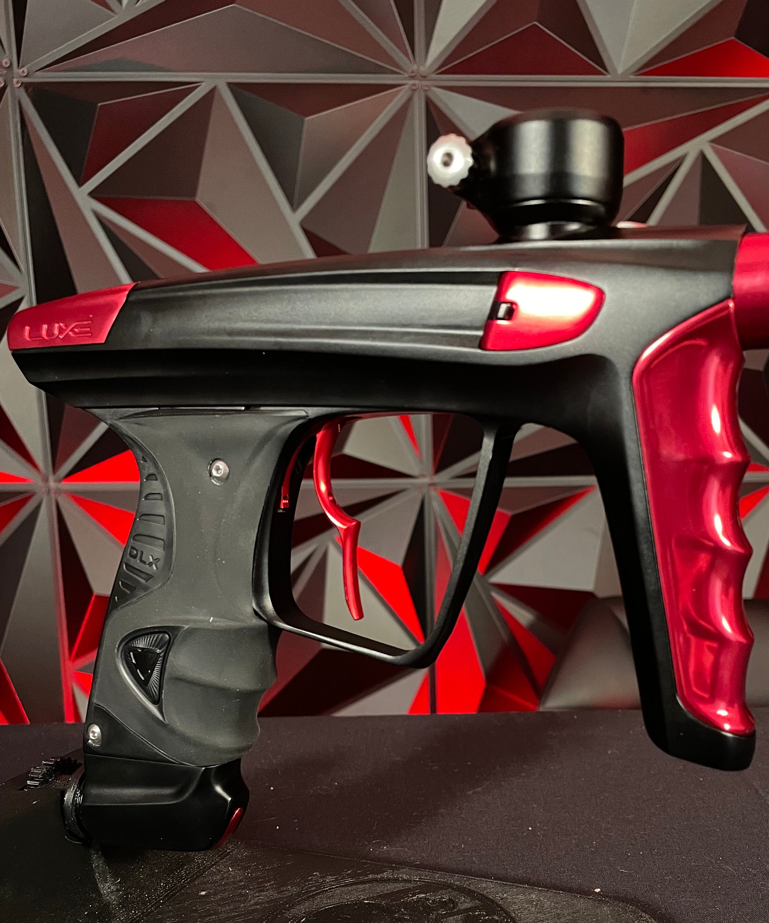 Used DLX Luxe X Paintball Gun - Dust Black / Gloss Red w/ Infamous Deuce Trigger