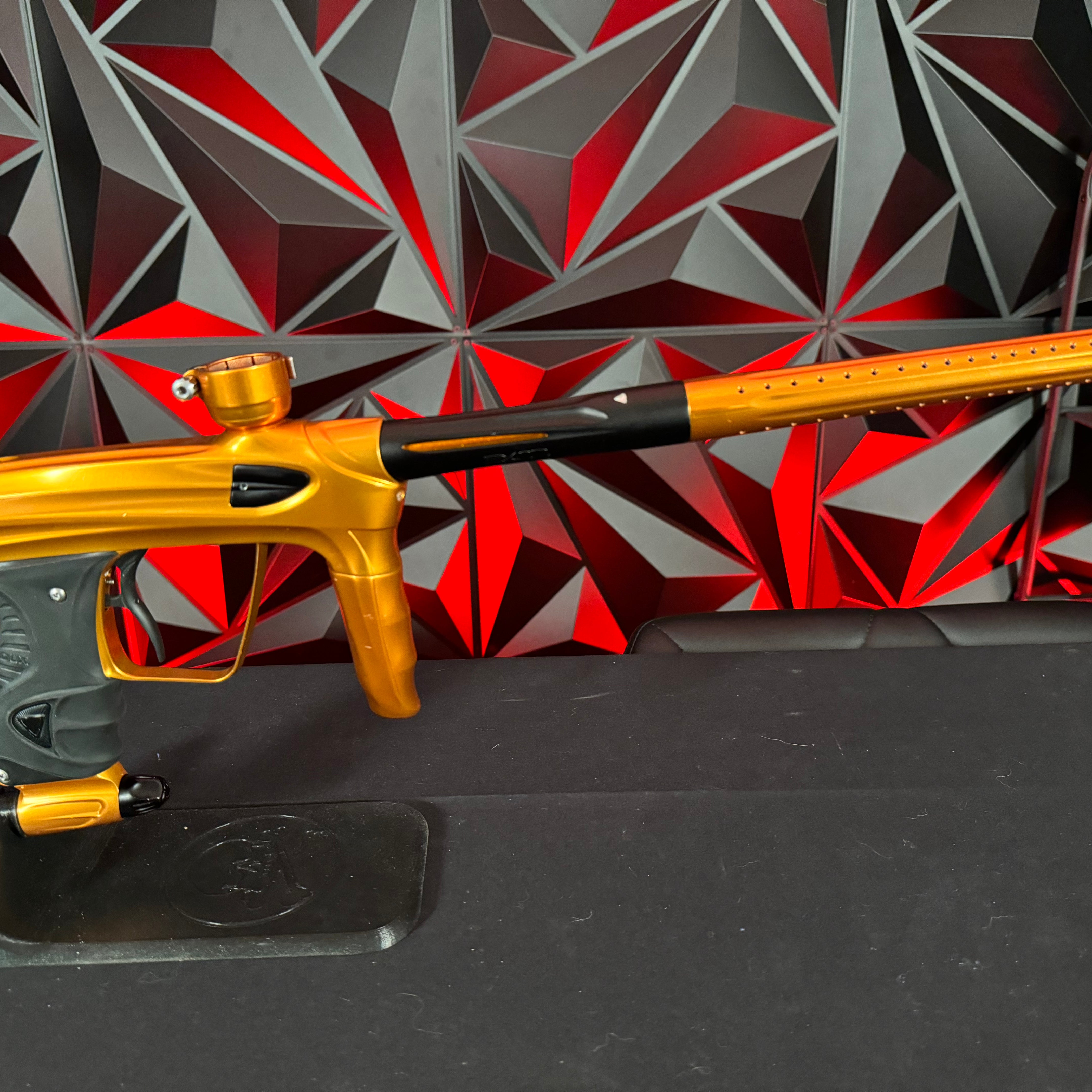 Used DLX Luxe 1.5 Paintball Gun - Polished Orange/Black w/2.0 Bolt