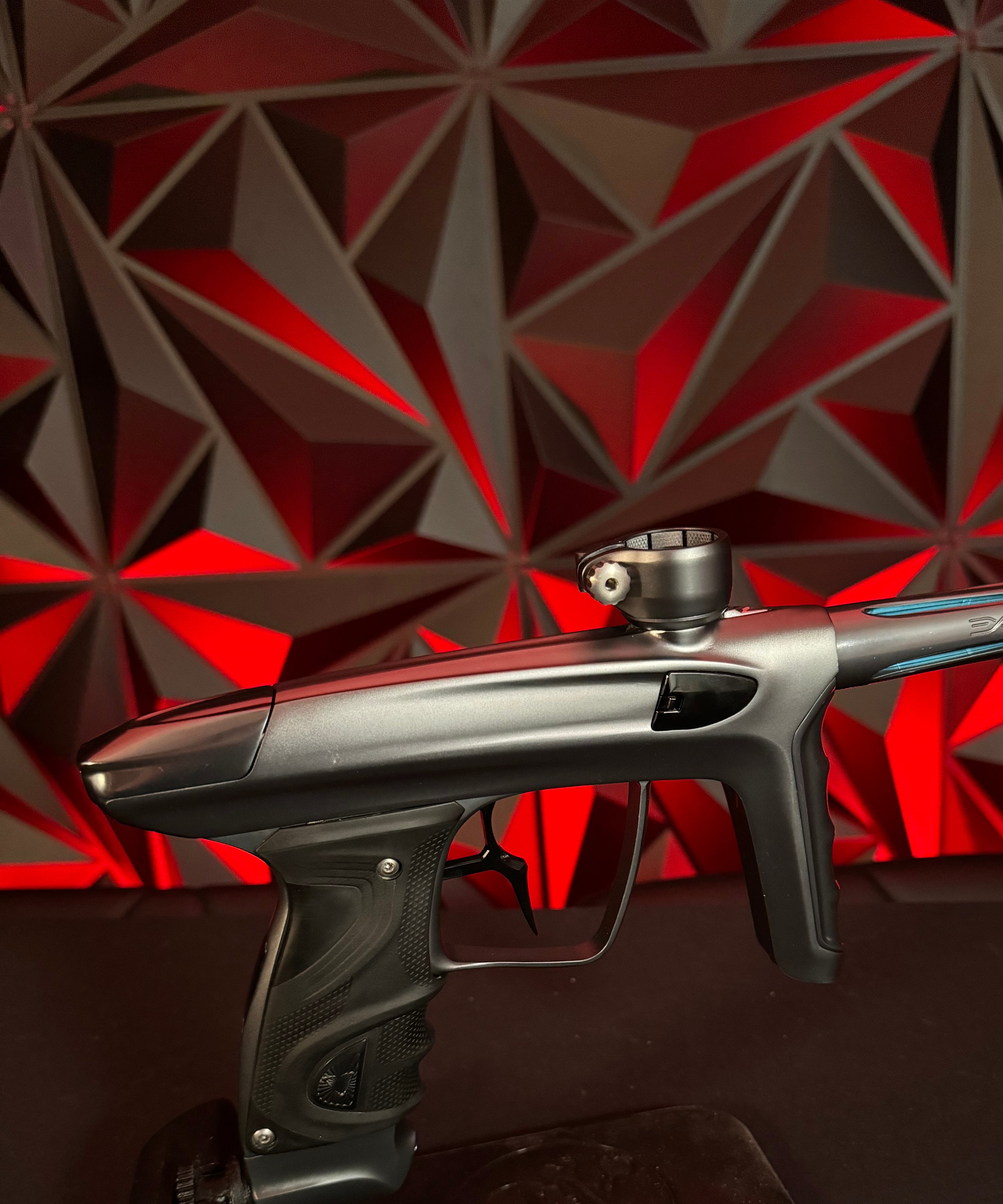 Used DLX TM40 Paintball Gun - Polished Pewter/Dust Pewter w/Infamous Deuce Trigger *Right side eye cover is Polished Black*