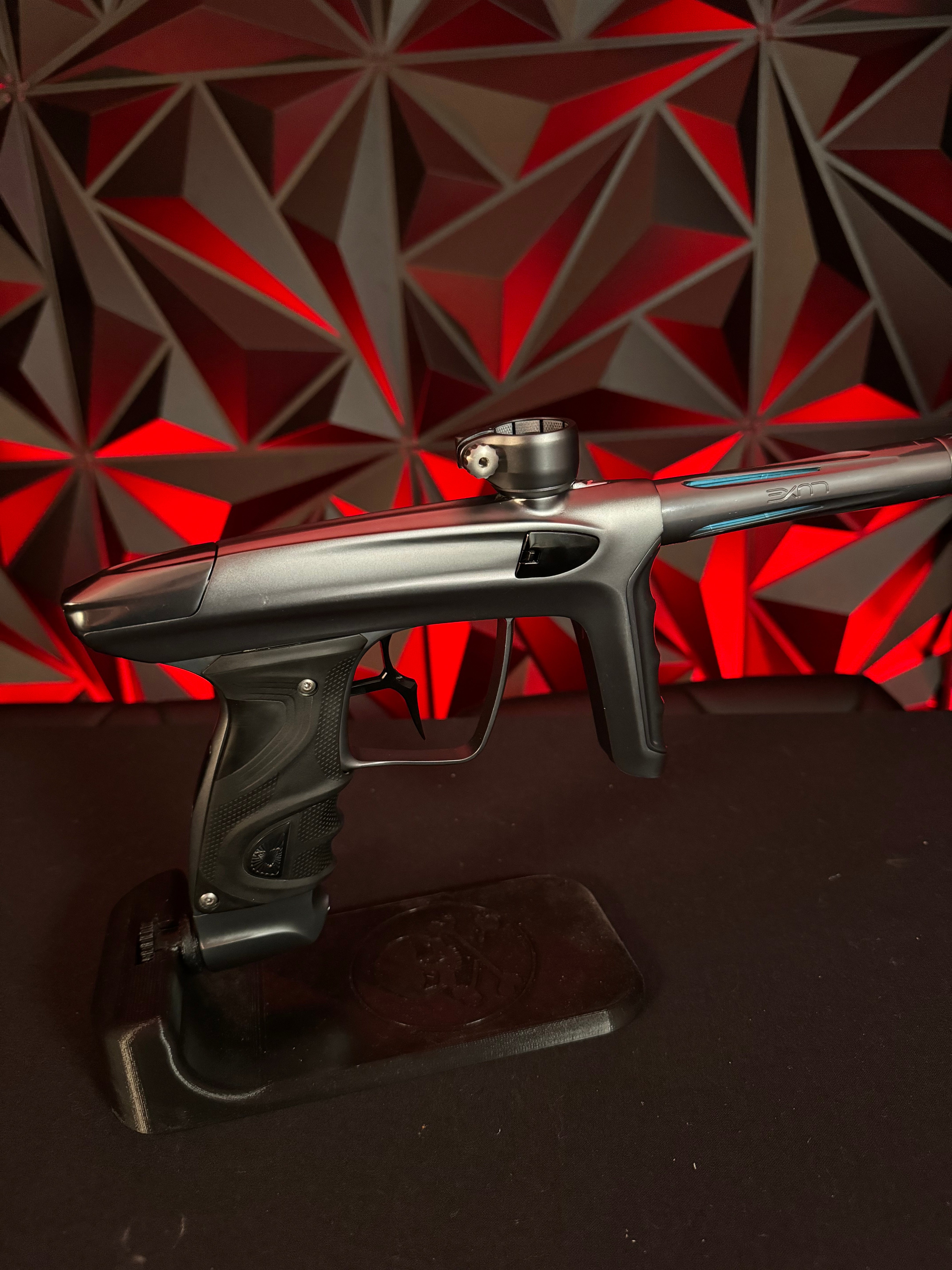 Used DLX TM40 Paintball Gun - Polished Pewter/Dust Pewter w/Infamous Deuce Trigger *Right side eye cover is Polished Black*