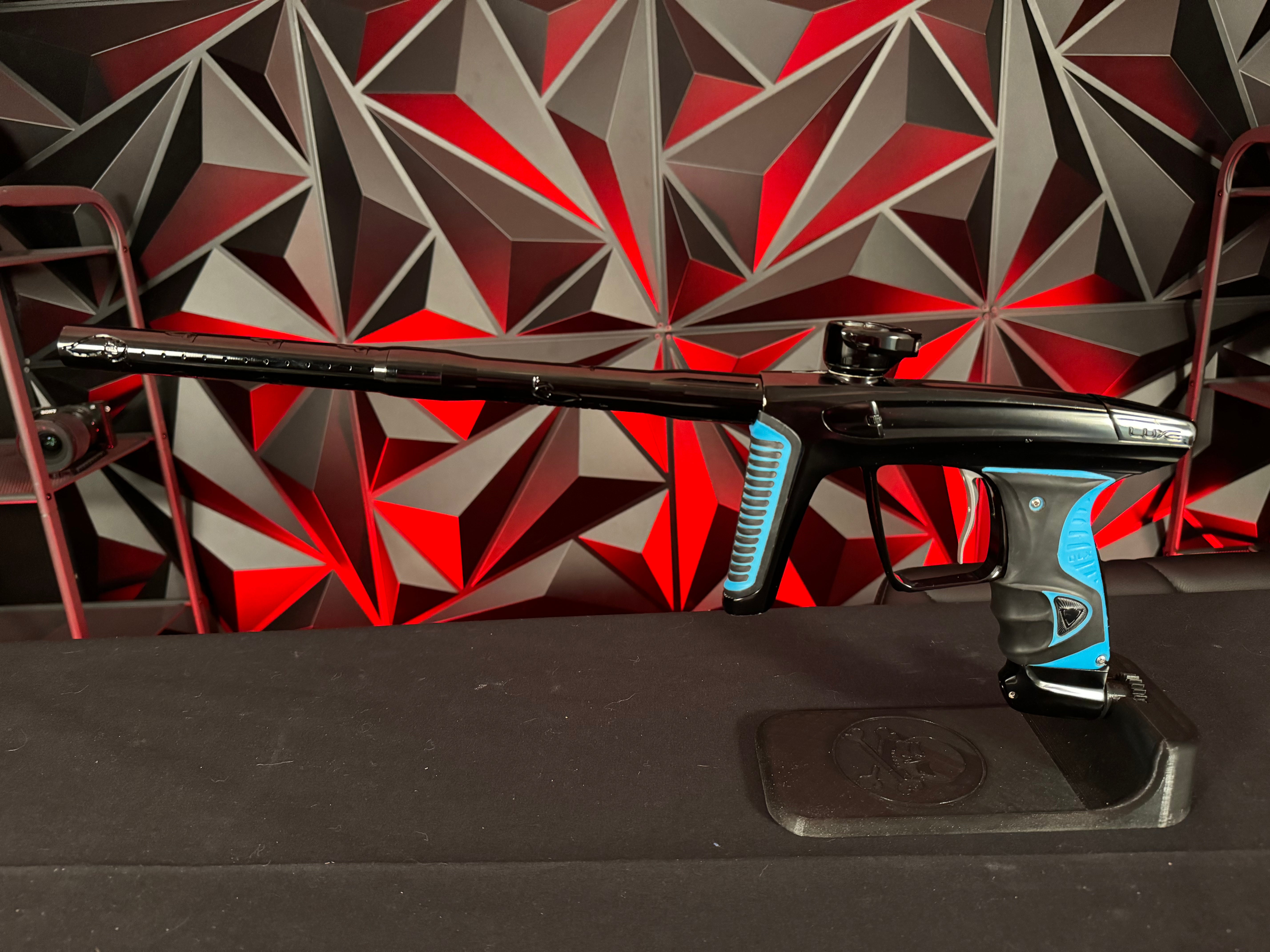Used DLX Luxe X Paintball Gun - Black w/ Blue Grips