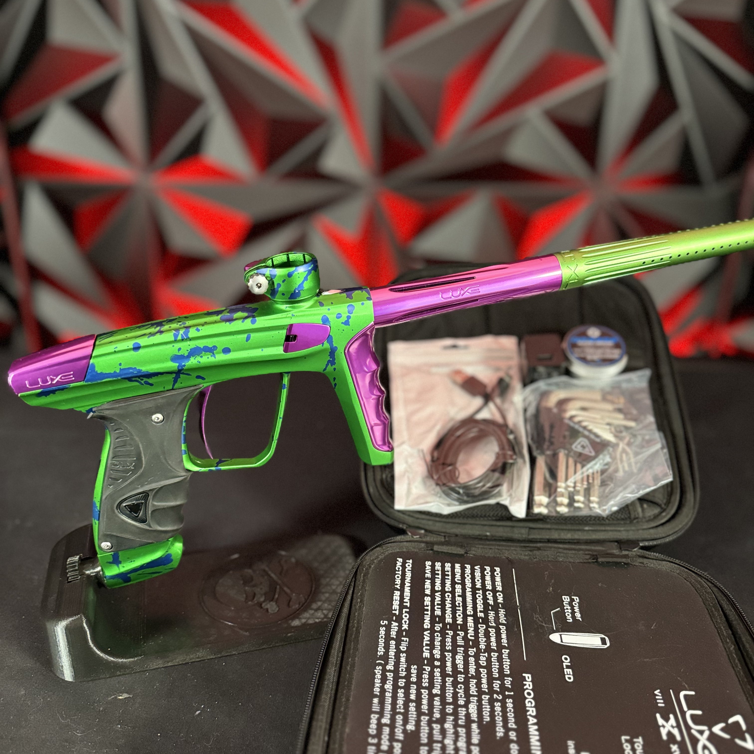 Used DLX Luxe X Paintball Marker - LE Green/Purple Splash w/Green ACP Tip