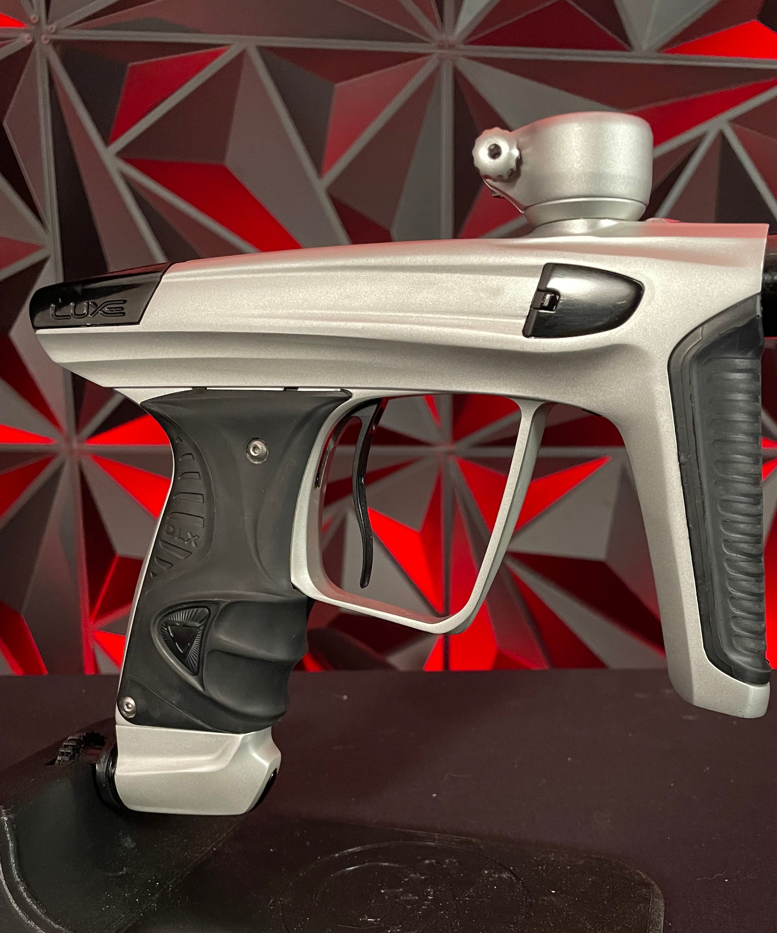 Used DLX Luxe X Paintball Gun - Dust Silver/Polished Black w/Scythe Trigger & Spare Grips