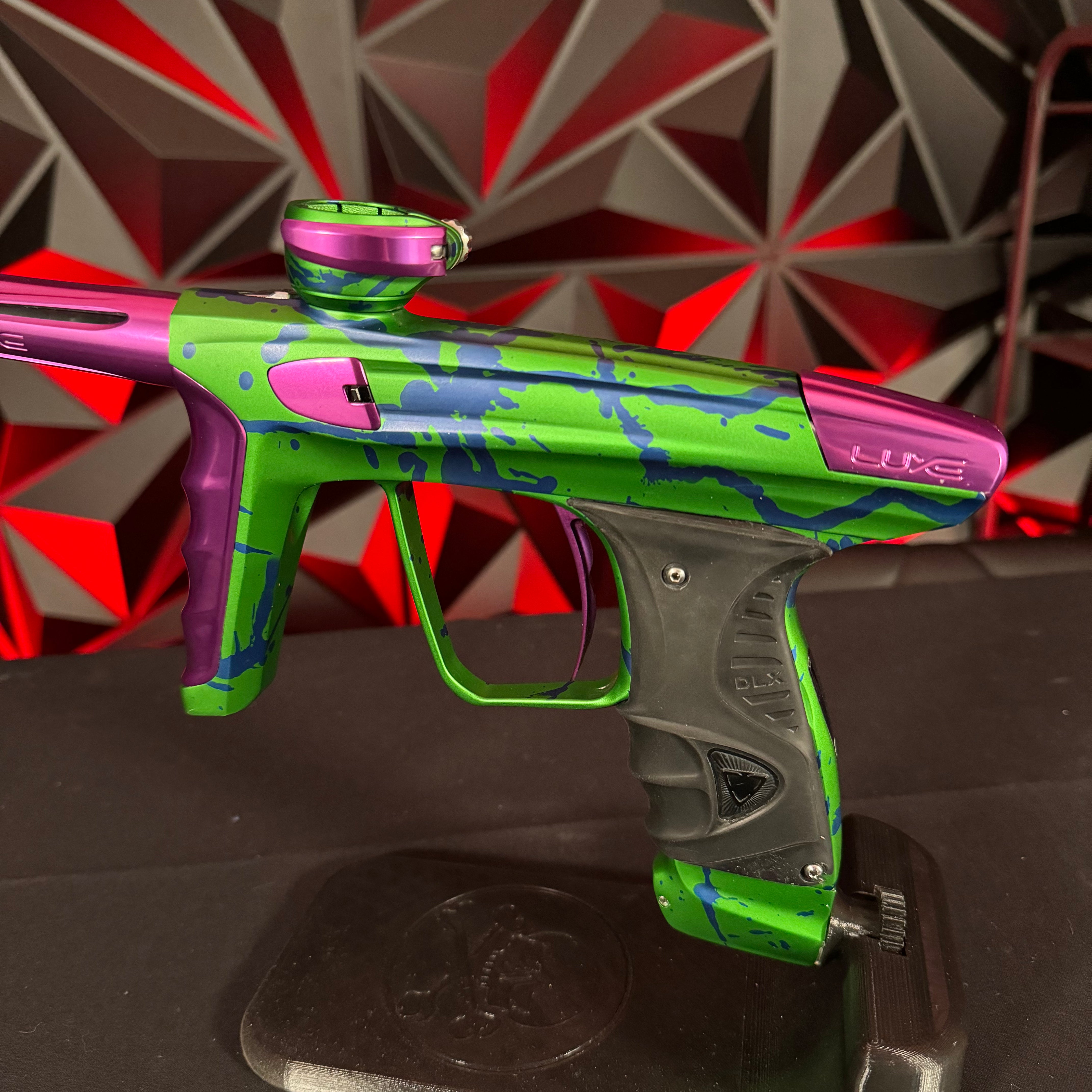 Used DLX Luxe X Paintball Marker - LE Green/Purple Splash w/Green ACP Tip