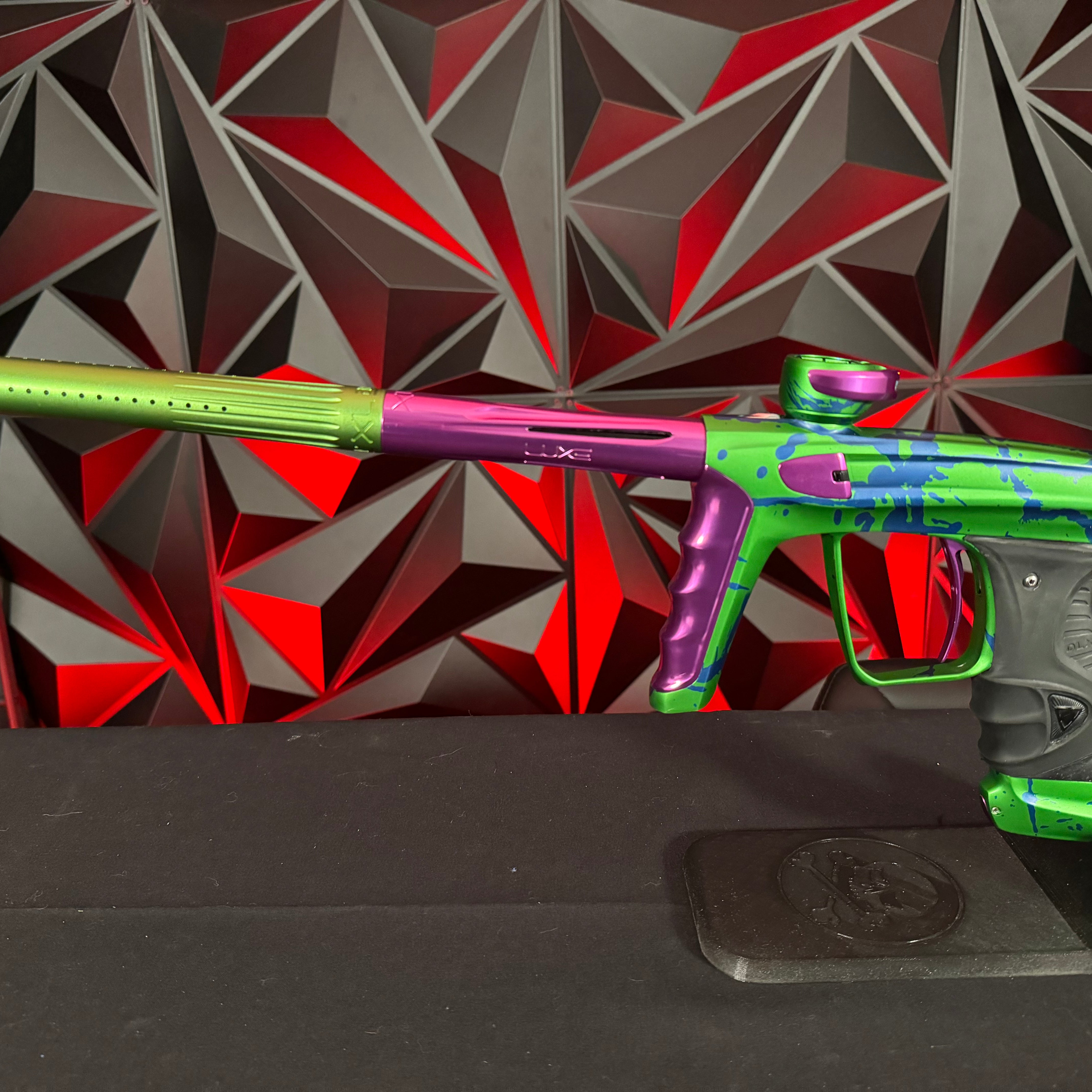 Used DLX Luxe X Paintball Marker - LE Green/Purple Splash w/Green ACP Tip