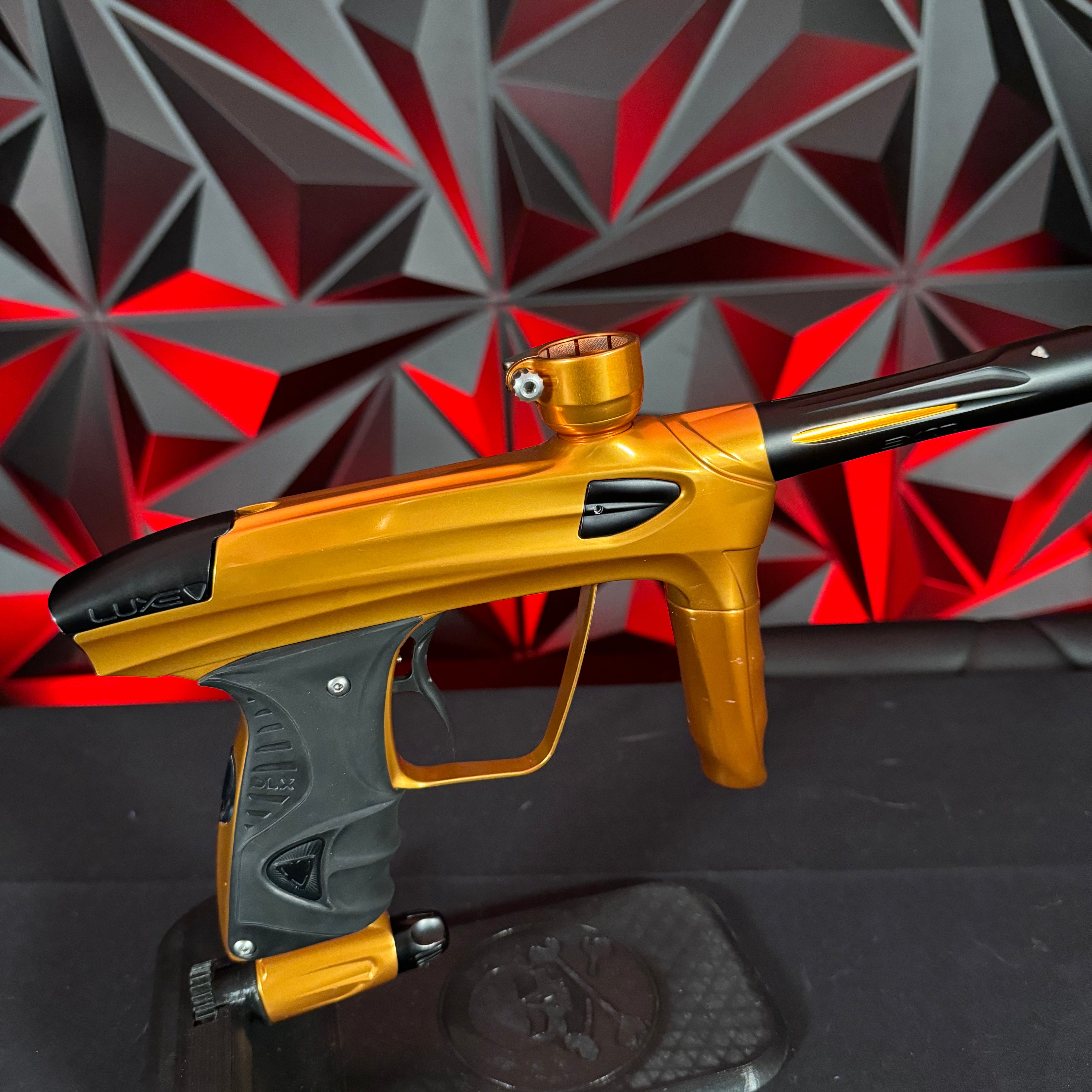 Used DLX Luxe 1.5 Paintball Gun - Polished Orange/Black w/2.0 Bolt