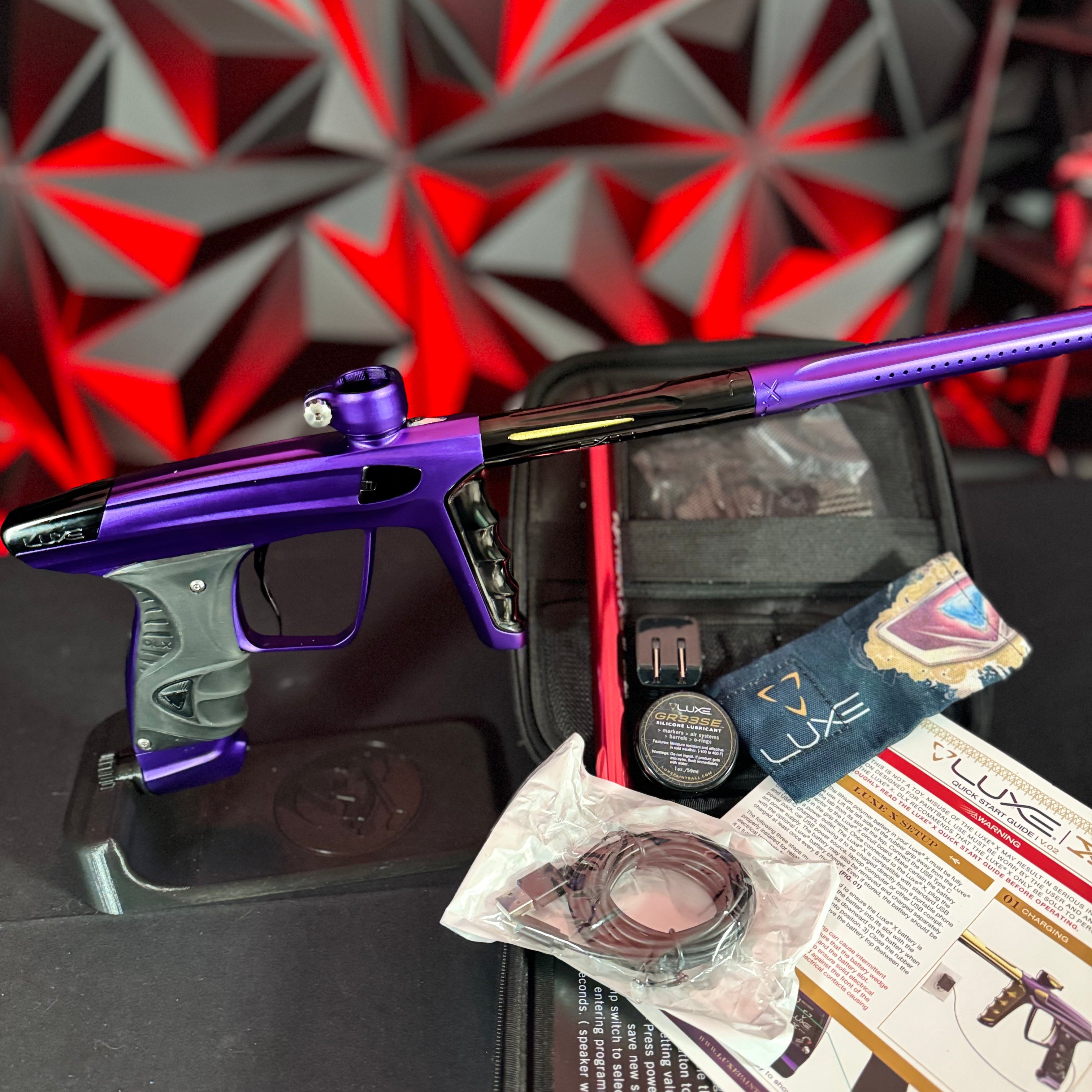 Used DLX Luxe X Paintball Gun - Dust Purple/Polished Black