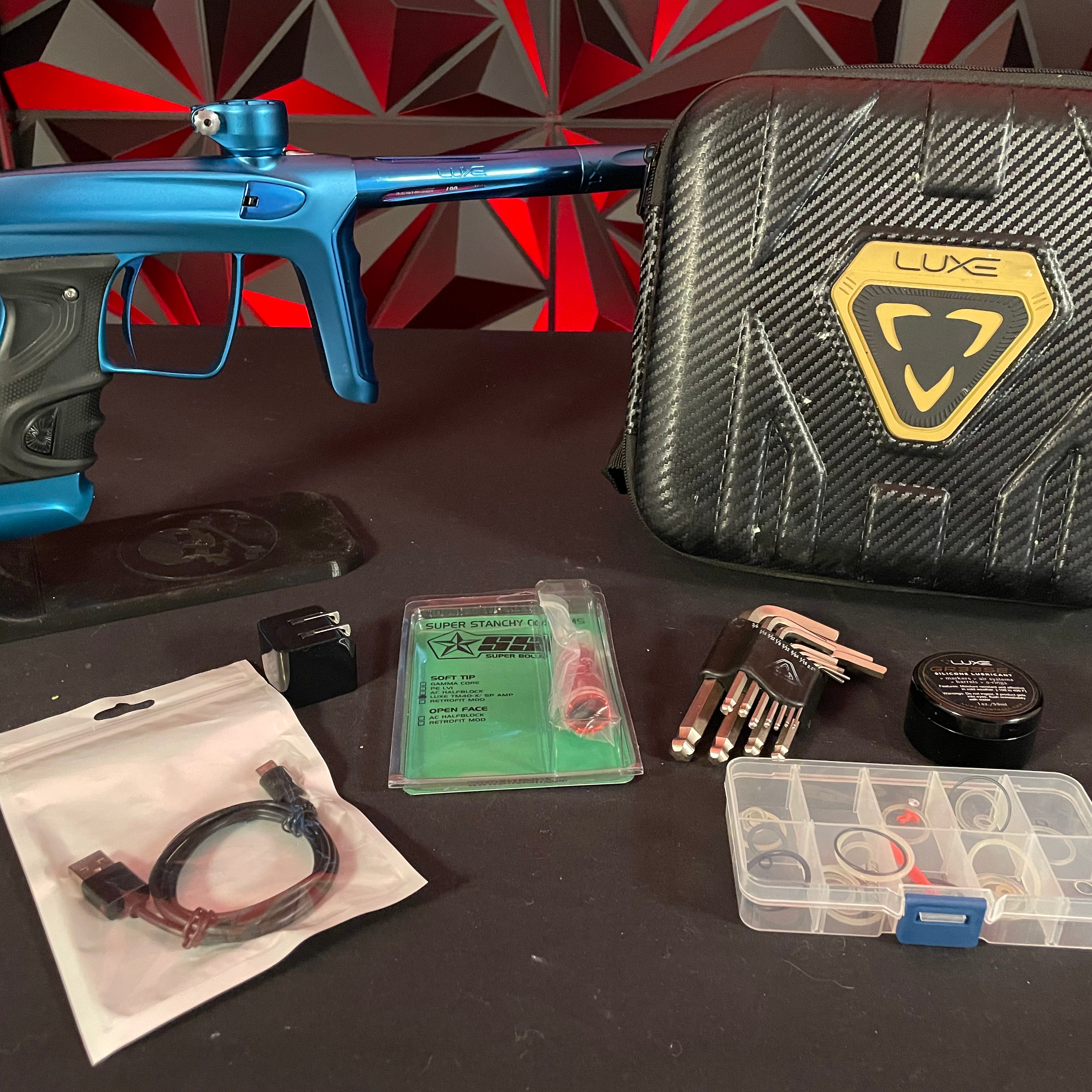 Used DLX Luxe TM40 Paintball Gun - Dust Blue / Polished Blue w/ Infamous Trigger & SSC Bolt