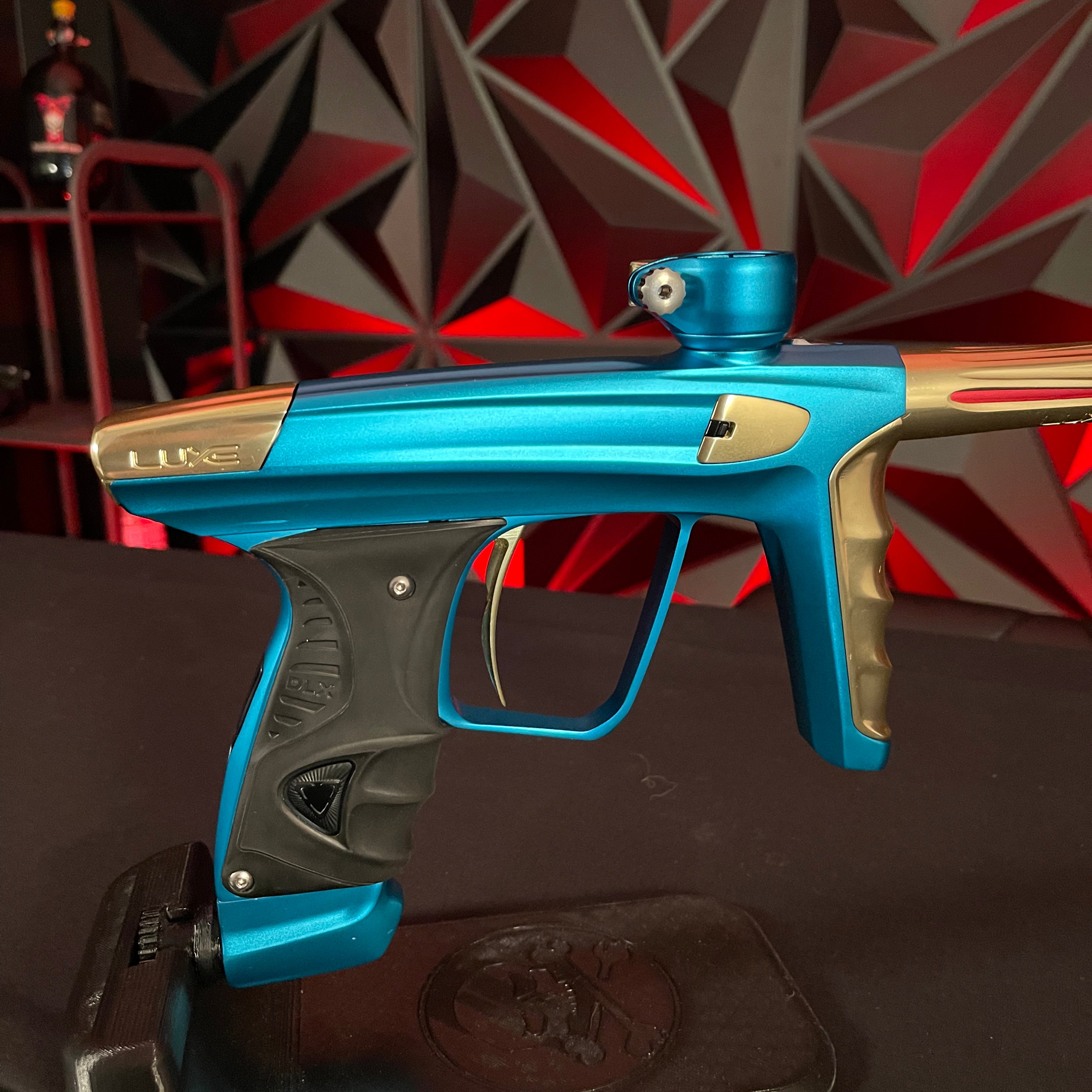 Used DLX Luxe X Paintball Gun - Dust Teal / Polished Gold