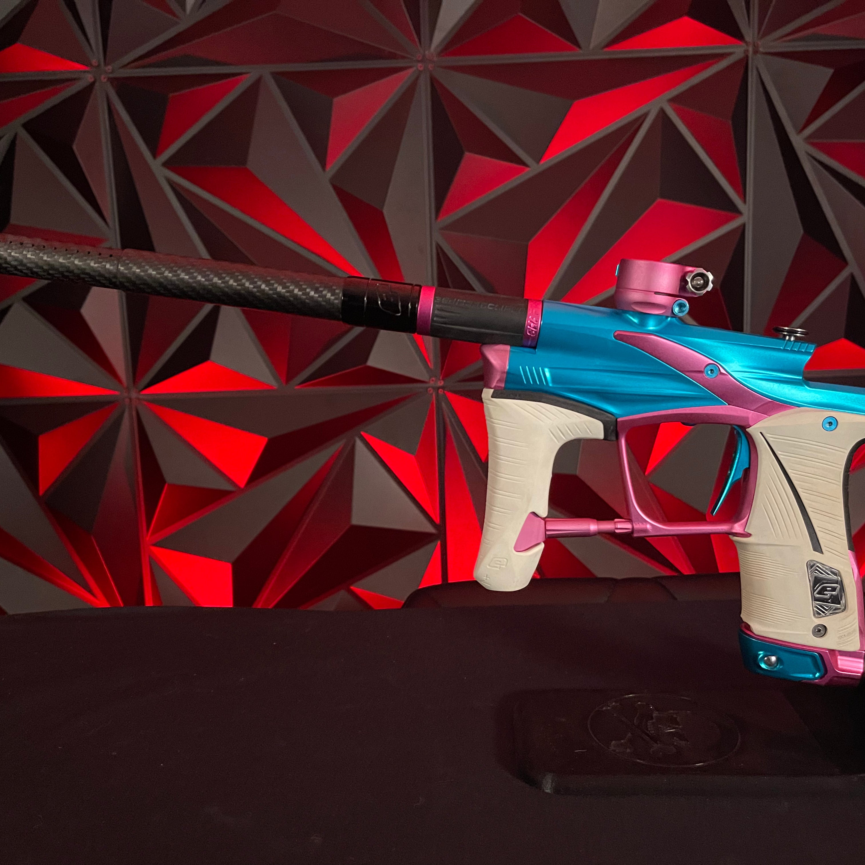 Used Planet Eclipse LV1.6 Paintball Gun - Teal / Pink w/White Grip Kit