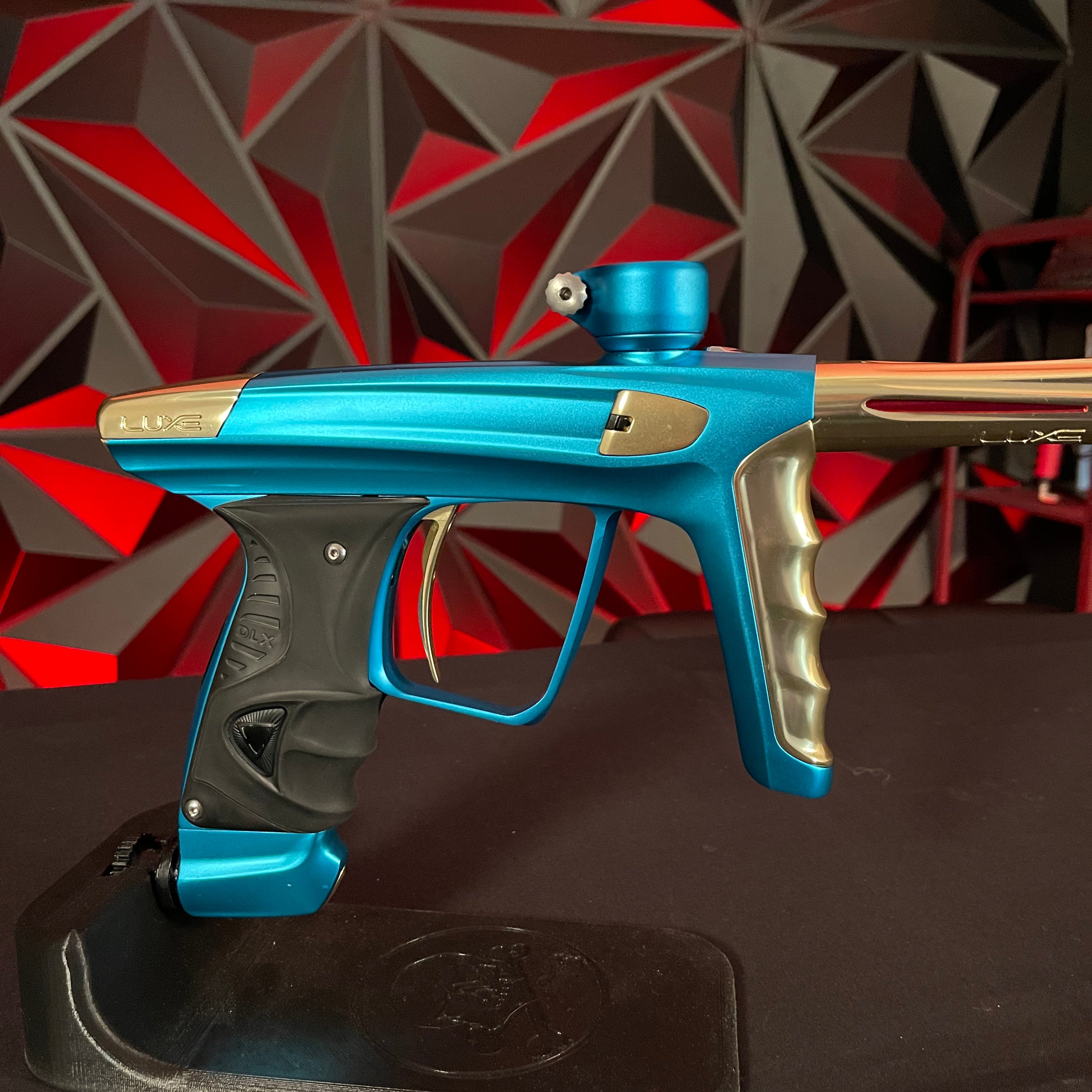 Used DLX Luxe X Paintball Gun - Dust Teal / Polished Gold