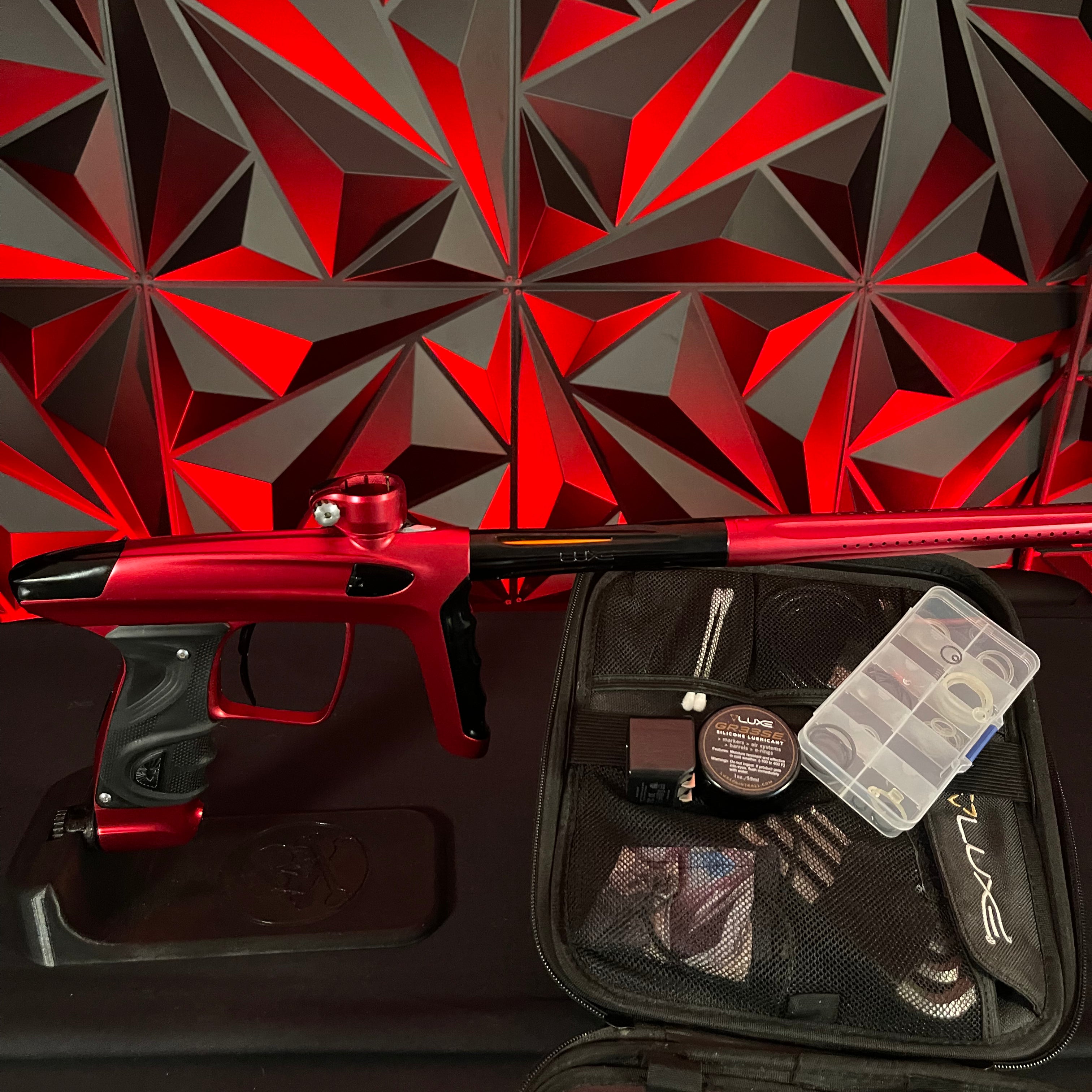 Used DLX Luxe TM40 Paintball Gun- Dust Red/Polished Black