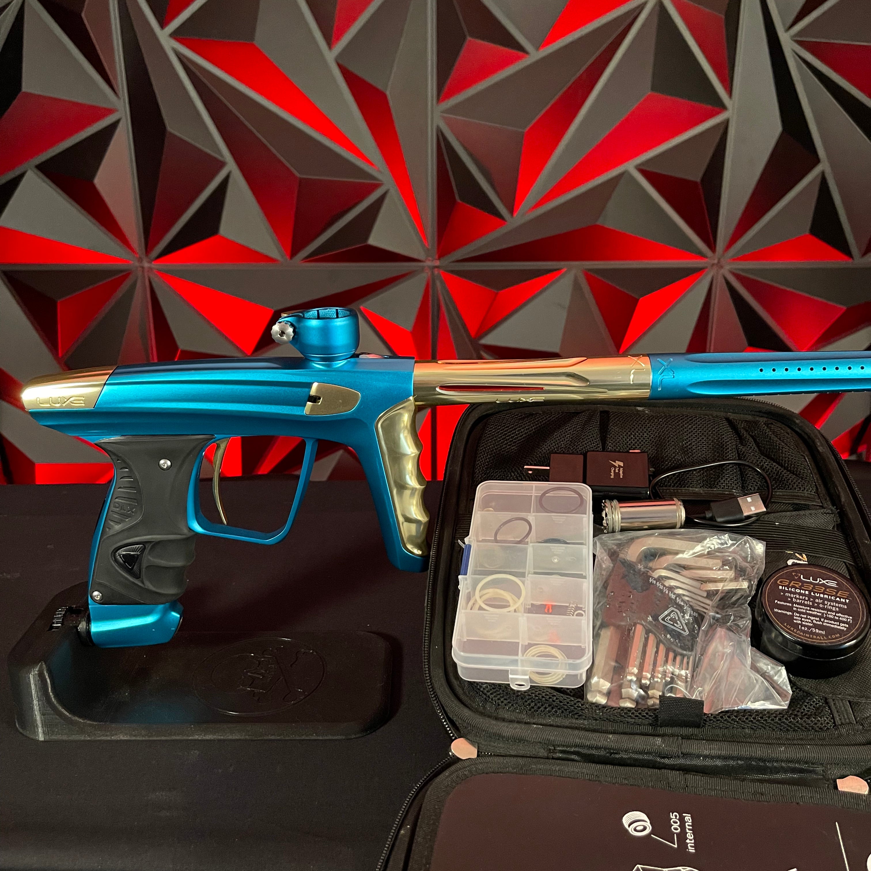 Used DLX Luxe X Paintball Gun - Dust Teal / Polished Gold