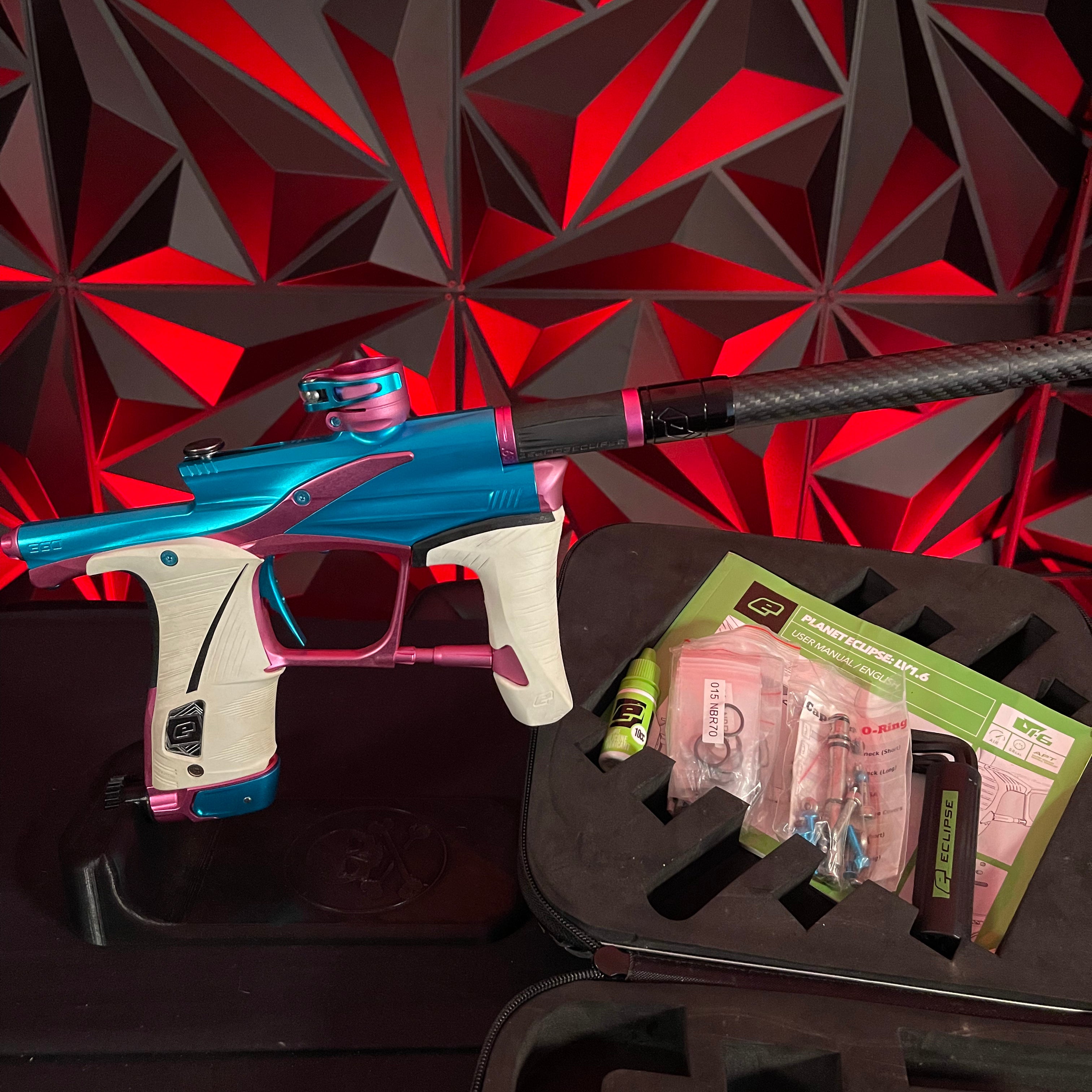 Used Planet Eclipse LV1.6 Paintball Gun - Teal / Pink w/White Grip Kit