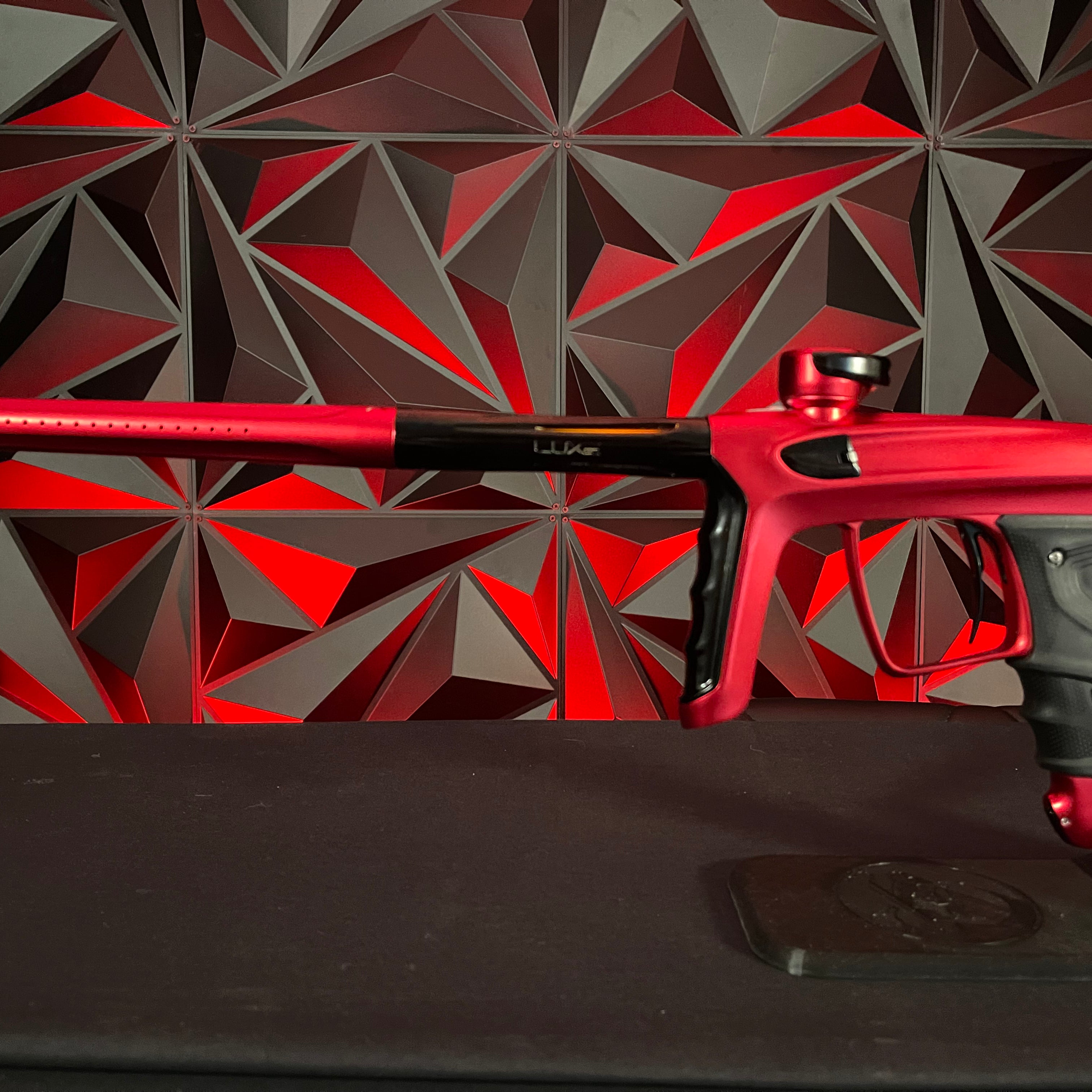 Used DLX Luxe TM40 Paintball Gun- Dust Red/Polished Black