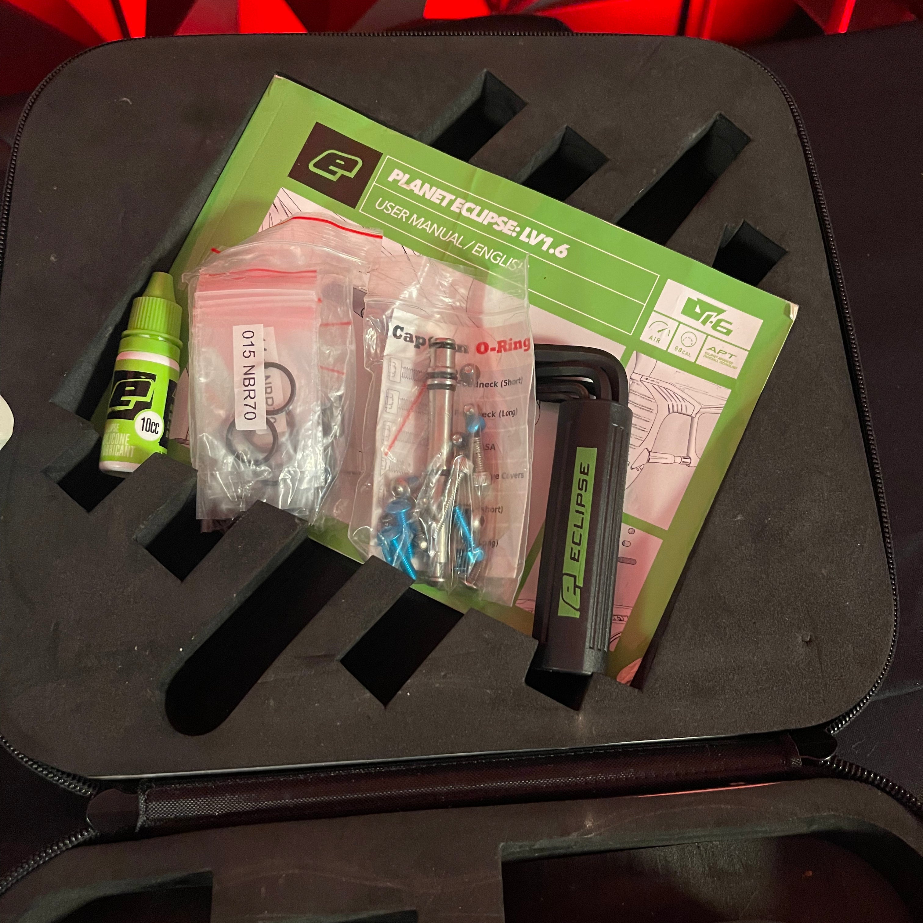 Used Planet Eclipse LV1.6 Paintball Gun - Teal / Pink w/White Grip Kit