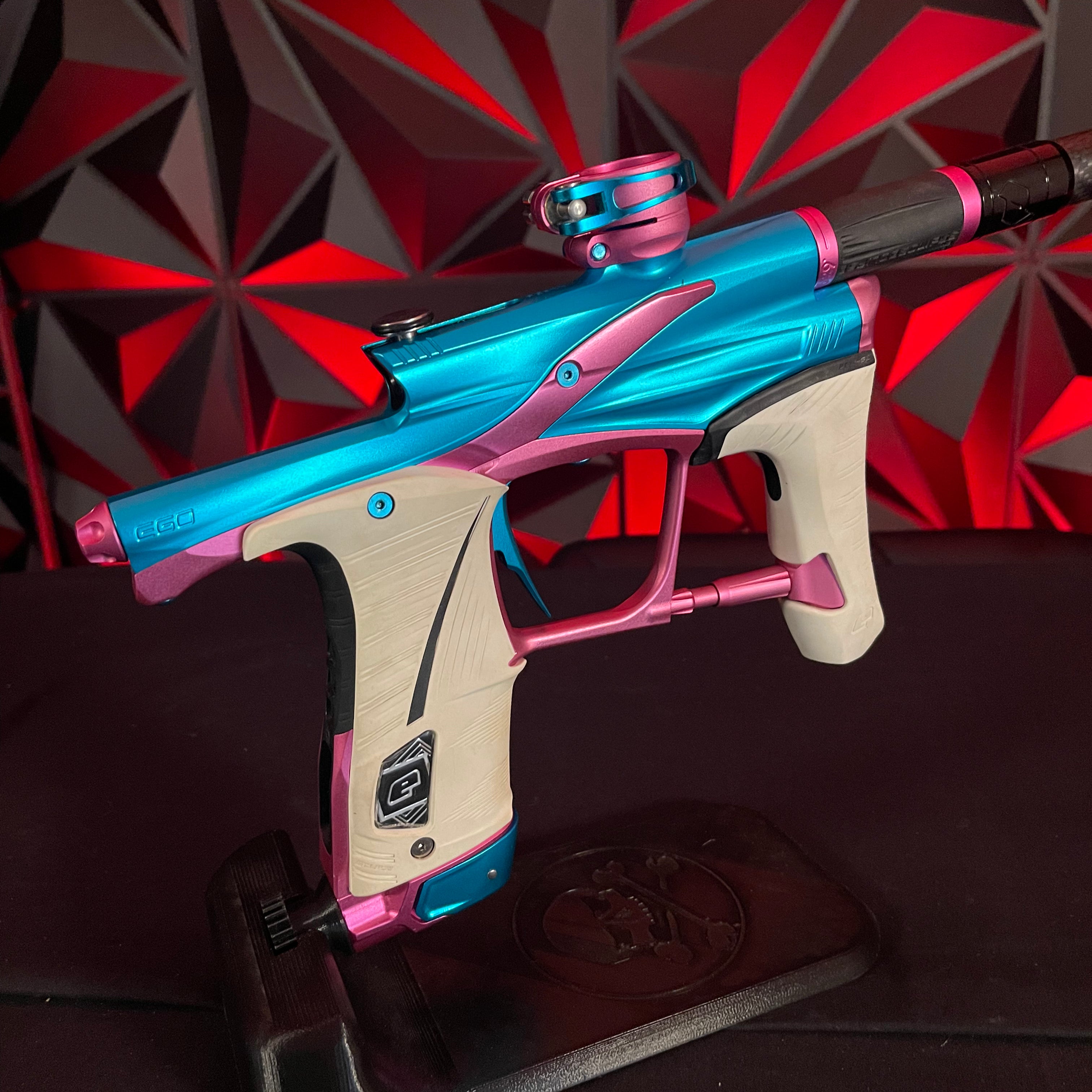 Used Planet Eclipse LV1.6 Paintball Gun - Teal / Pink w/White Grip Kit