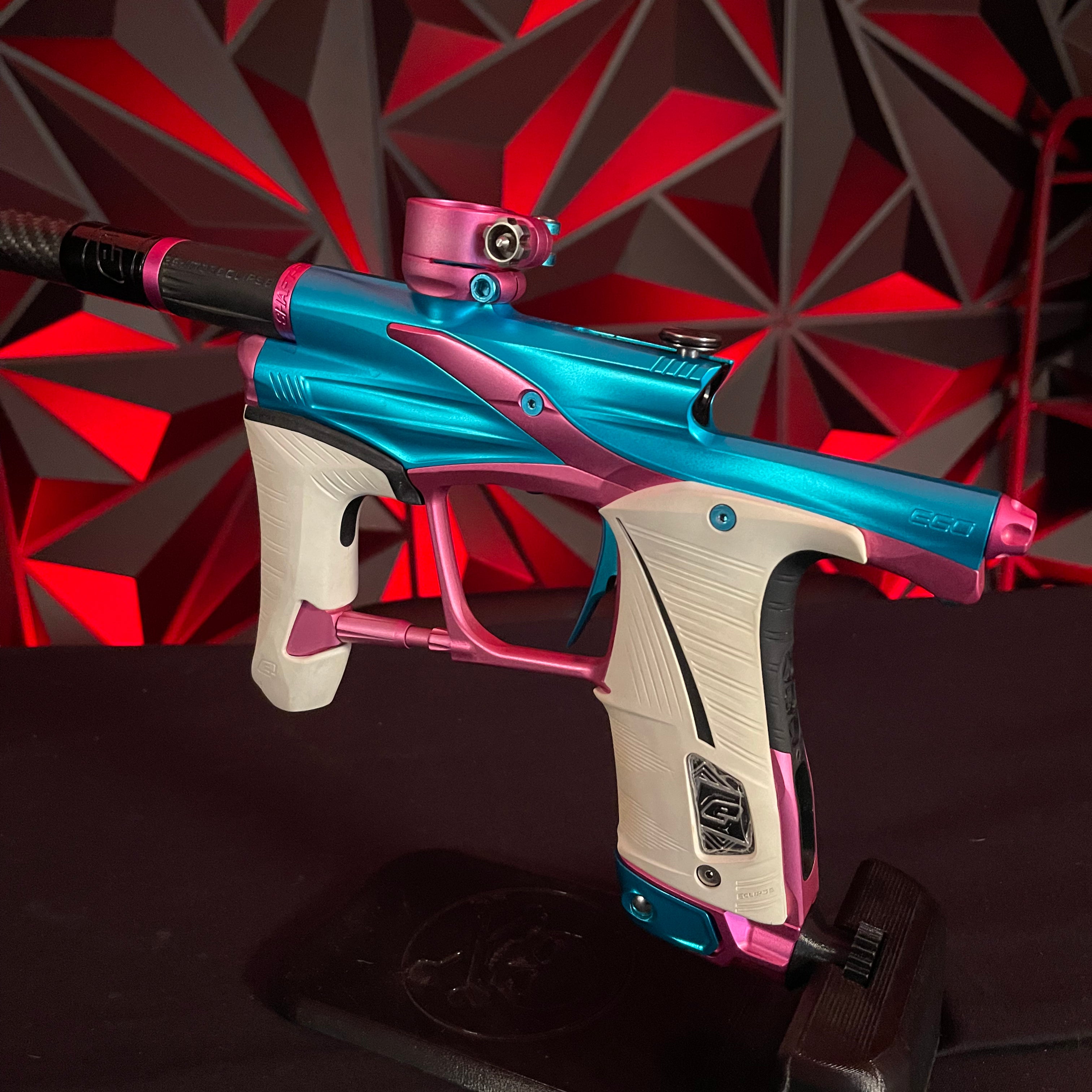 Used Planet Eclipse LV1.6 Paintball Gun - Teal / Pink w/White Grip Kit