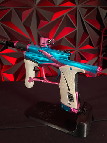 Used Planet Eclipse LV1.6 Paintball Gun - Teal / Pink w/White Grip Kit