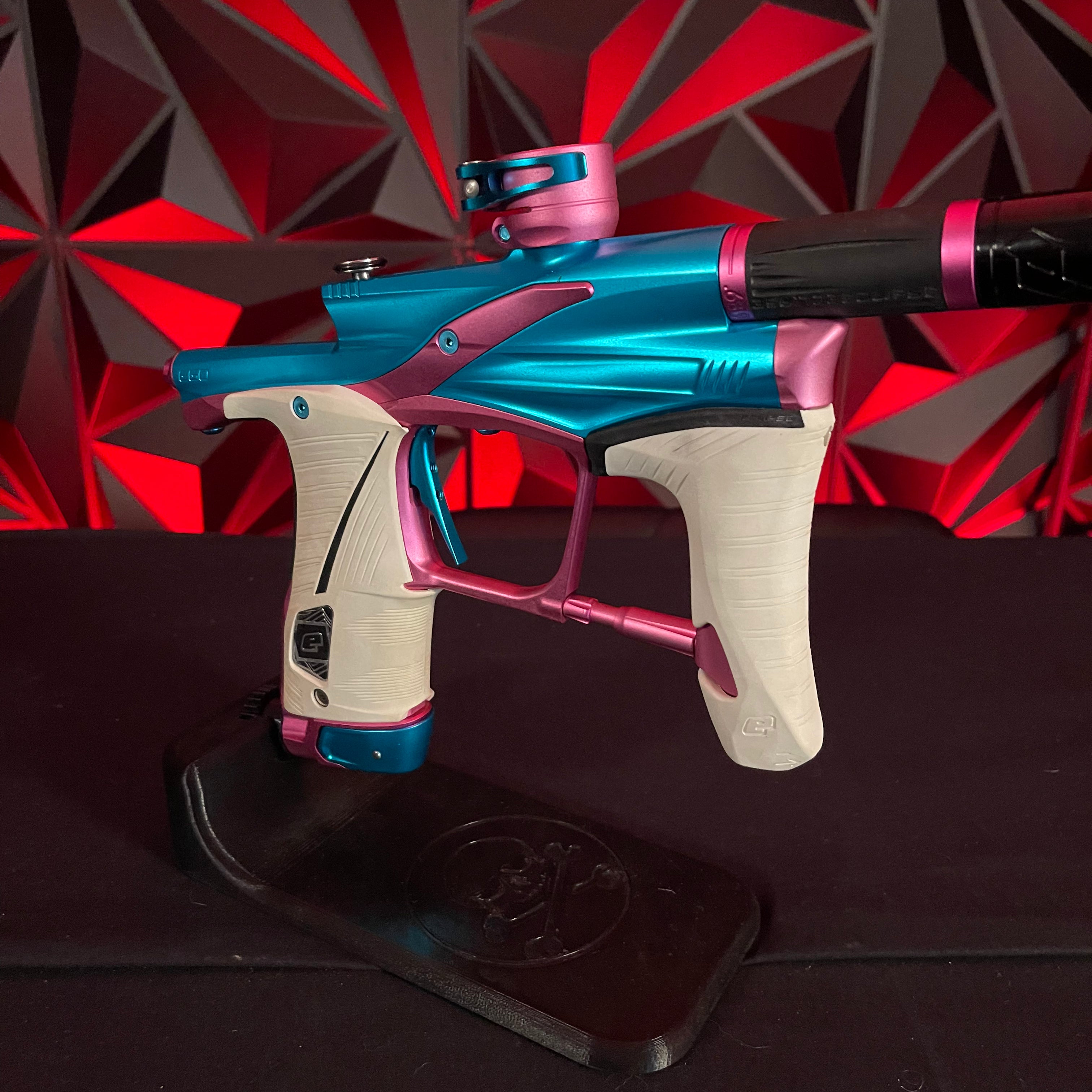 Used Planet Eclipse LV1.6 Paintball Gun - Teal / Pink w/White Grip Kit