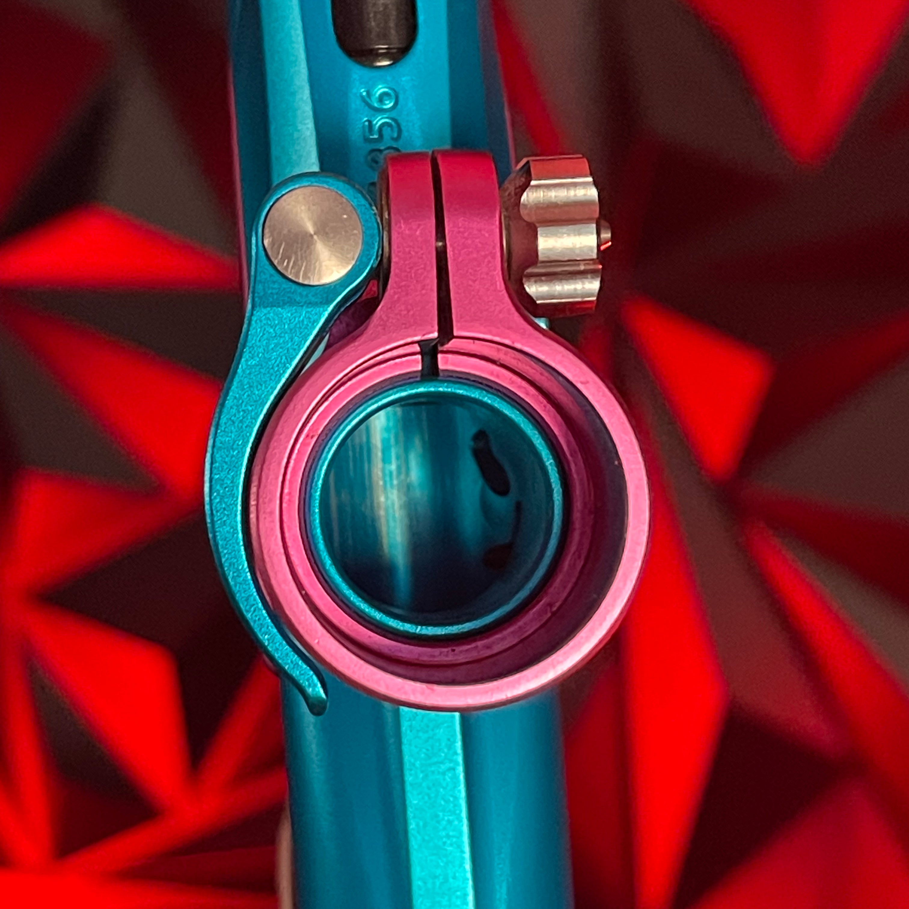 Used Planet Eclipse LV1.6 Paintball Gun - Teal / Pink w/White Grip Kit